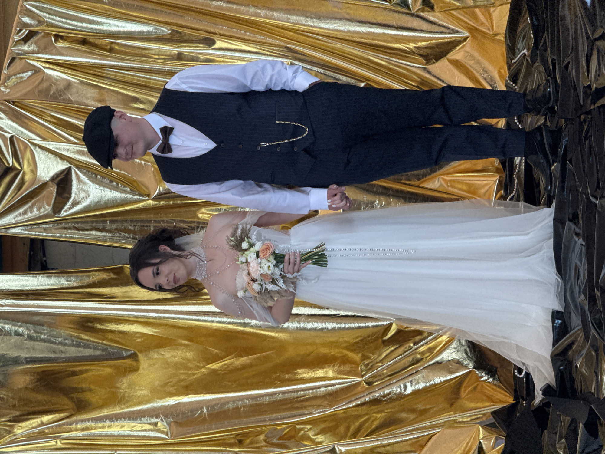 Wedding ceremony held at waterfront venue with covered patio