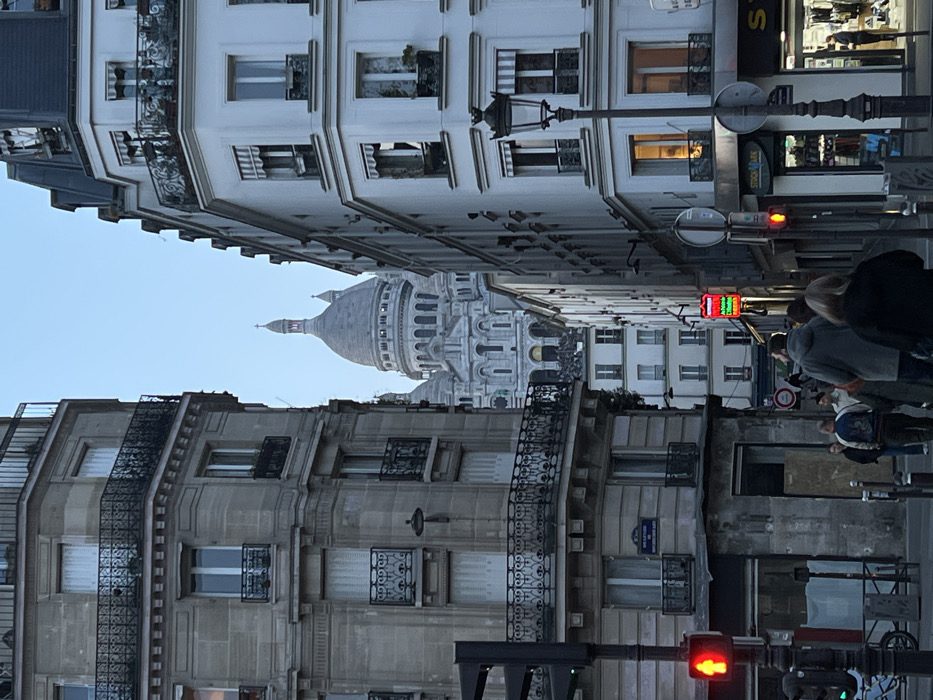 Observer documents Montmartre street views near Sacré-Cœur Basilica