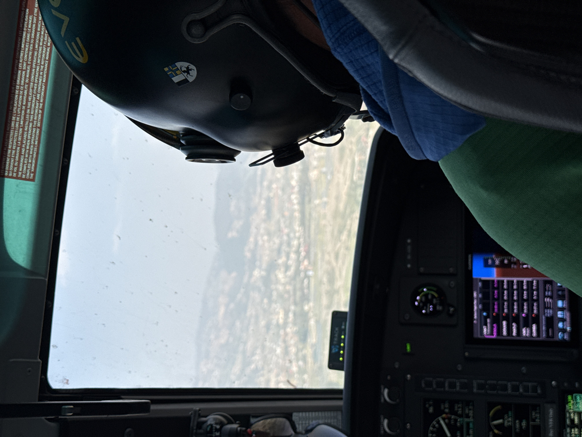 Helicopter flight documented over Changunarayan, Nepal from cockpit view