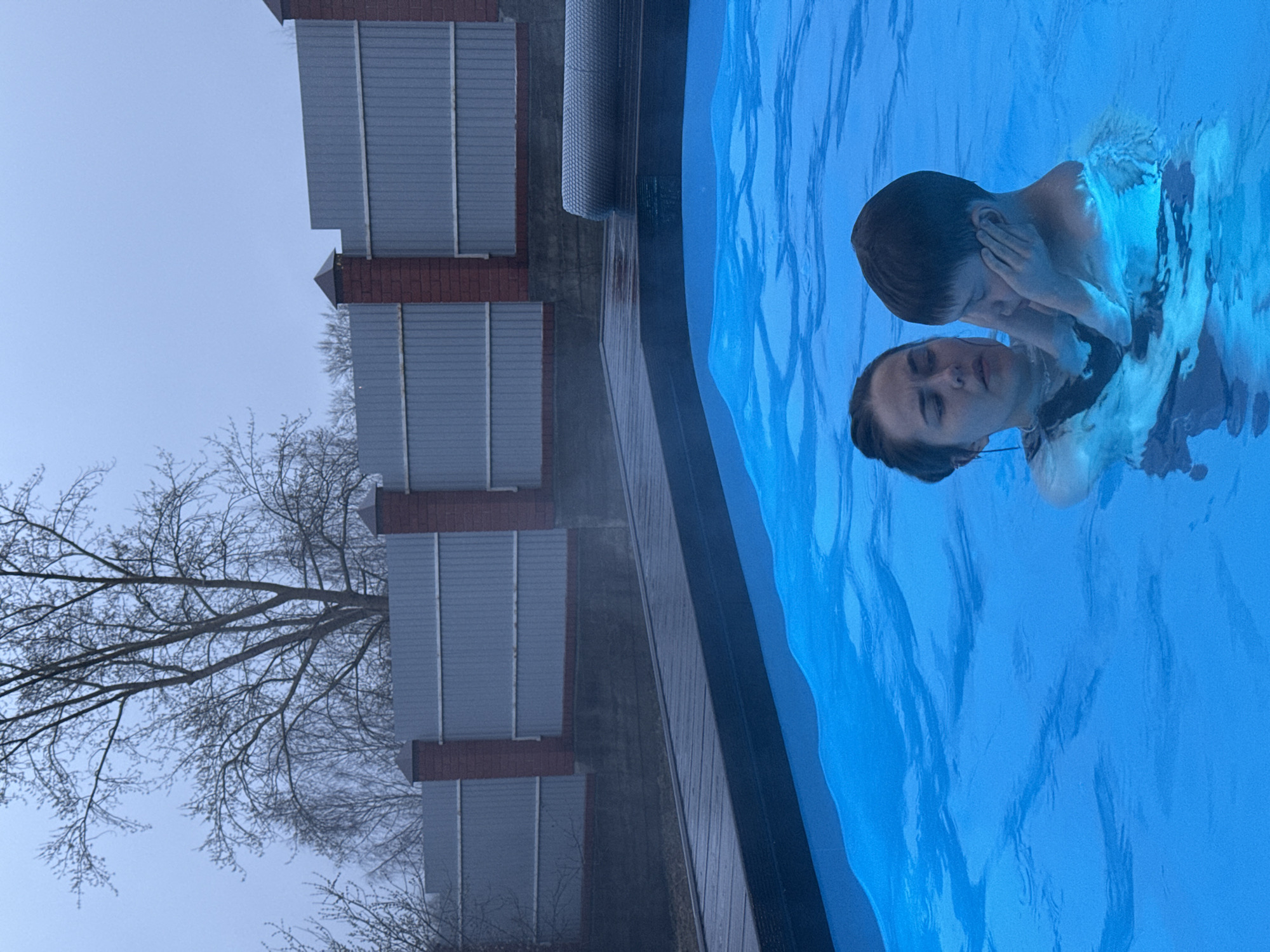 Family pool party and meal gathering documented in Perm