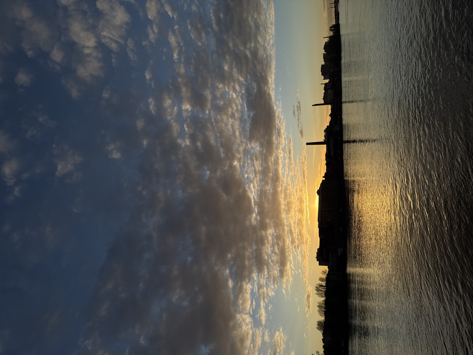 Golden hour sky patterns observed over Saint Petersburg waterfront