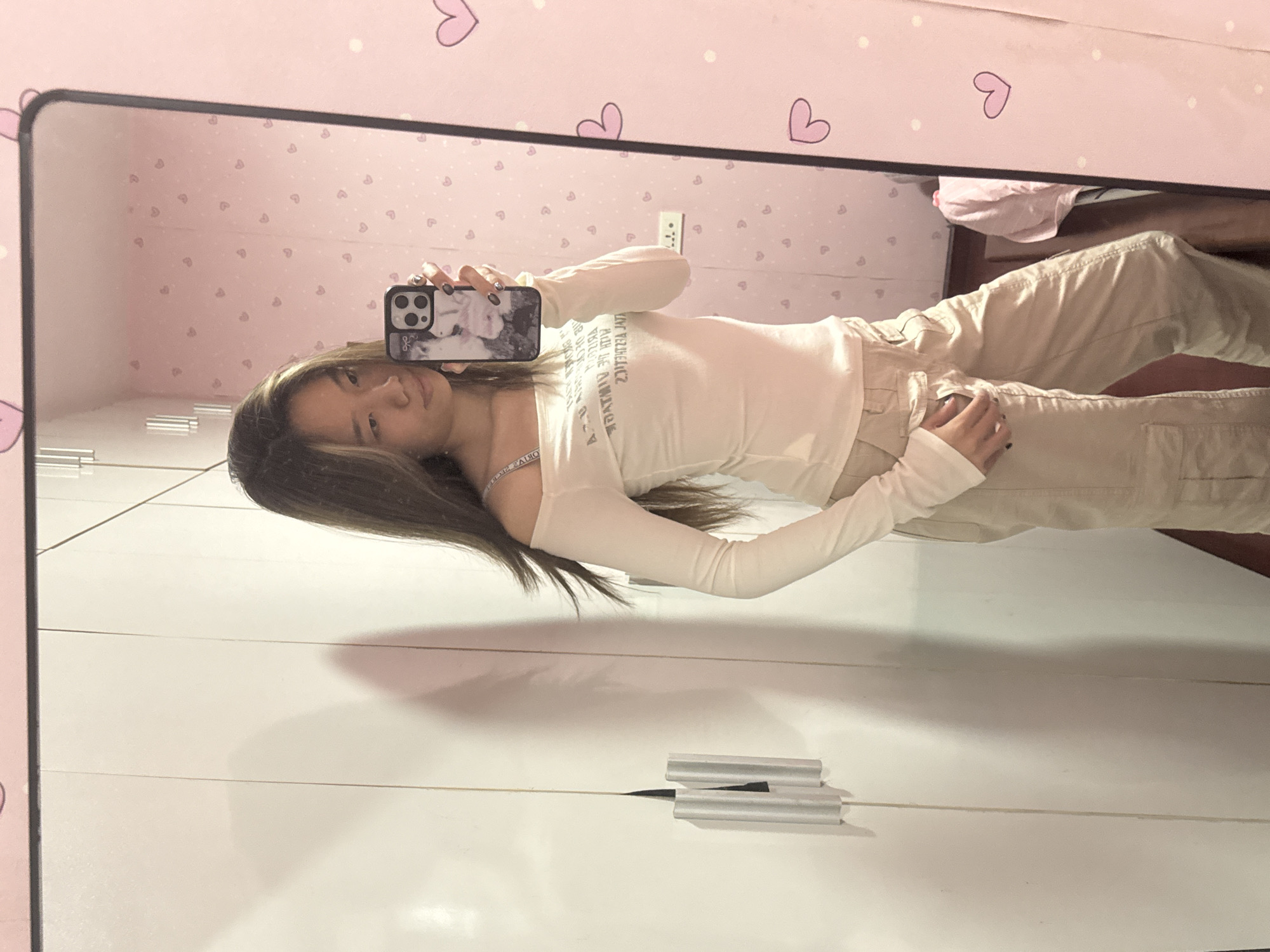 Woman takes mirror selfies in Shapingba District, China