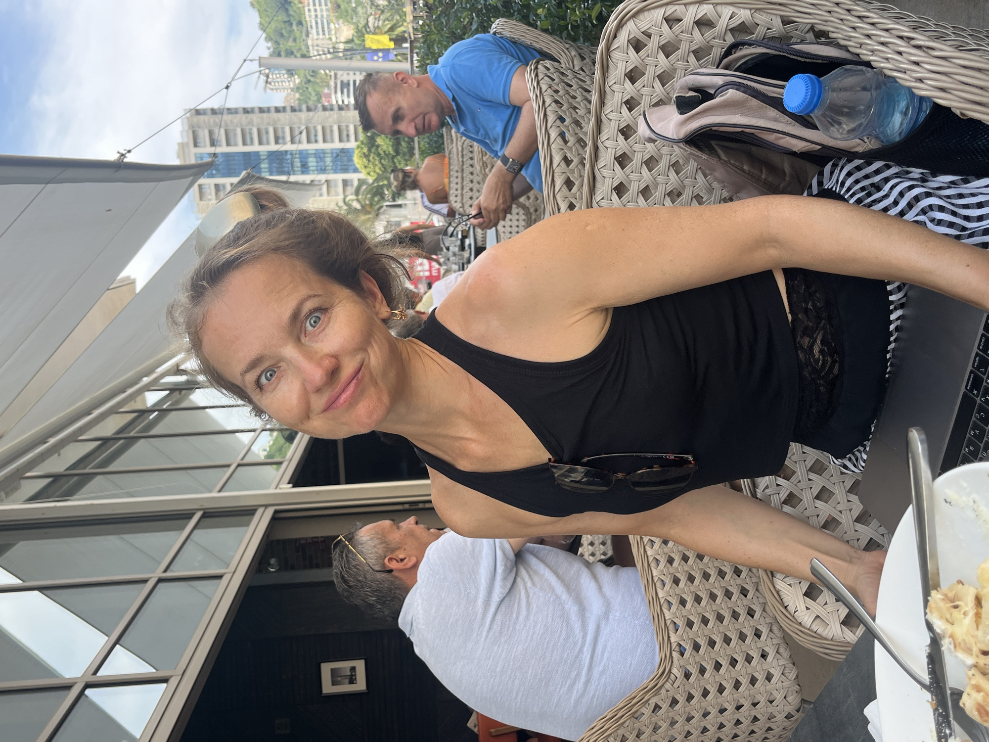 Café morning in Budva, food and conversation by the water