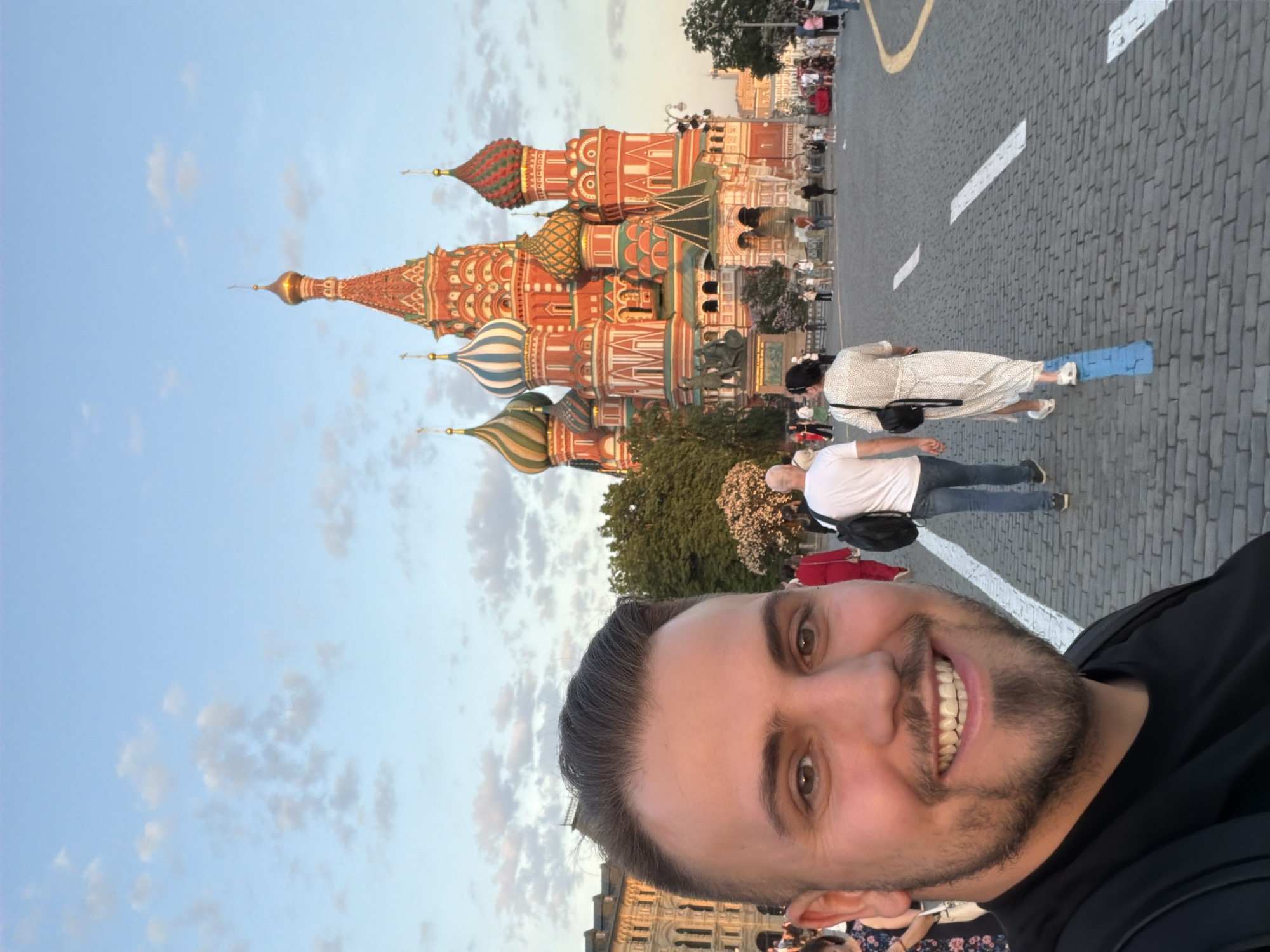 Tourist documents evening stroll through Moscow's Red Square landmarks