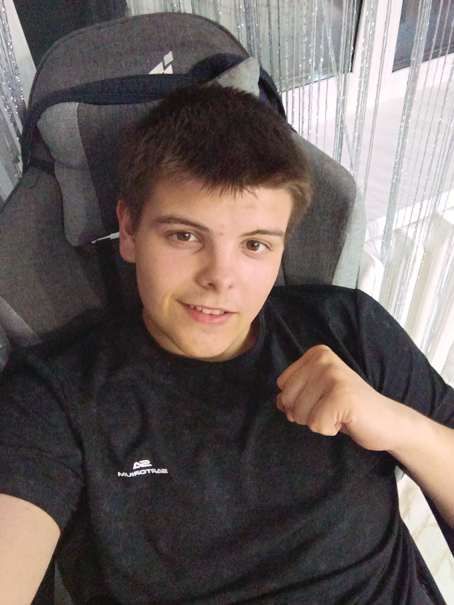 Young man captured during casual evening at home in Russia