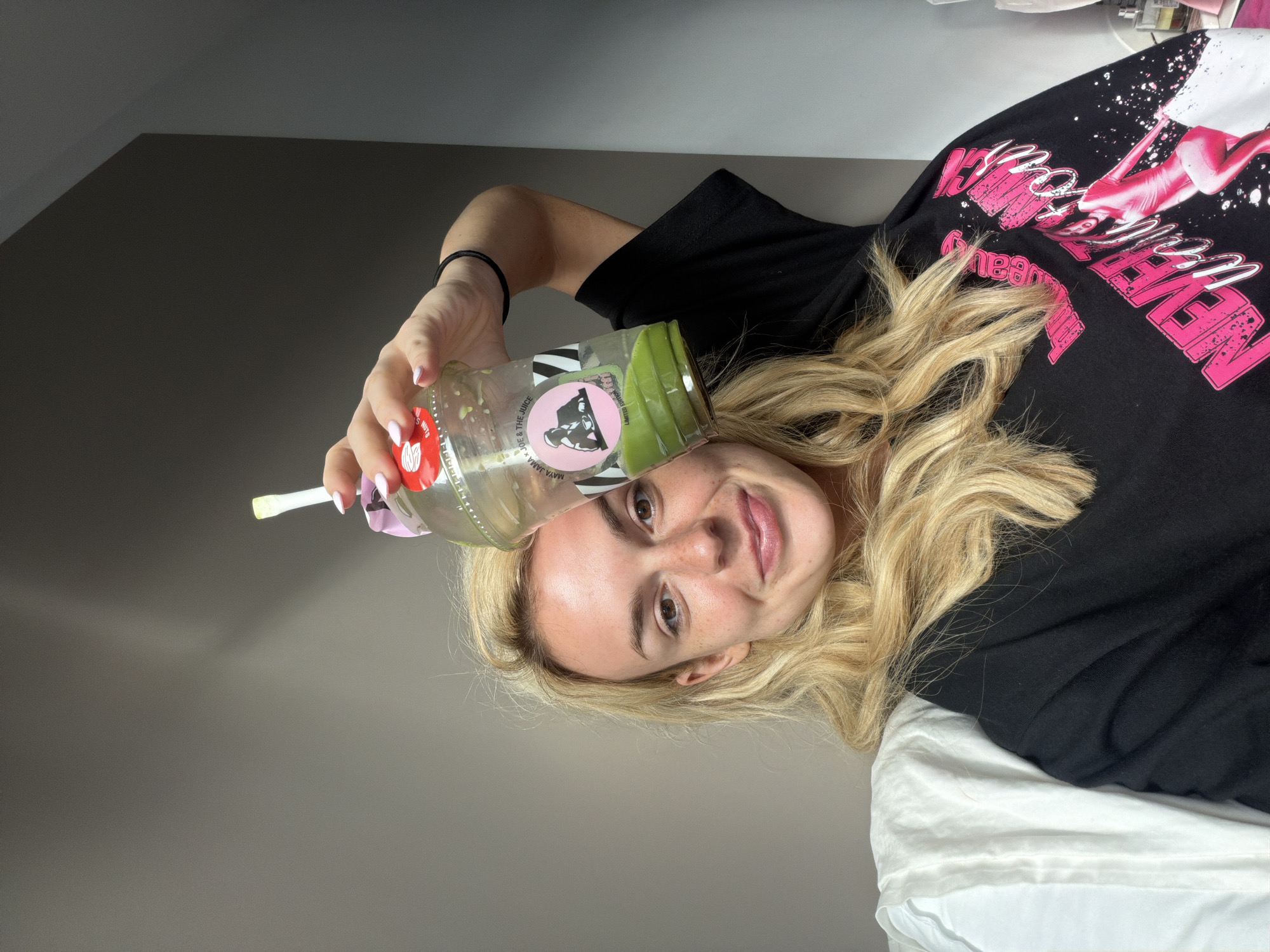 Woman photographed with plastic bottle in London