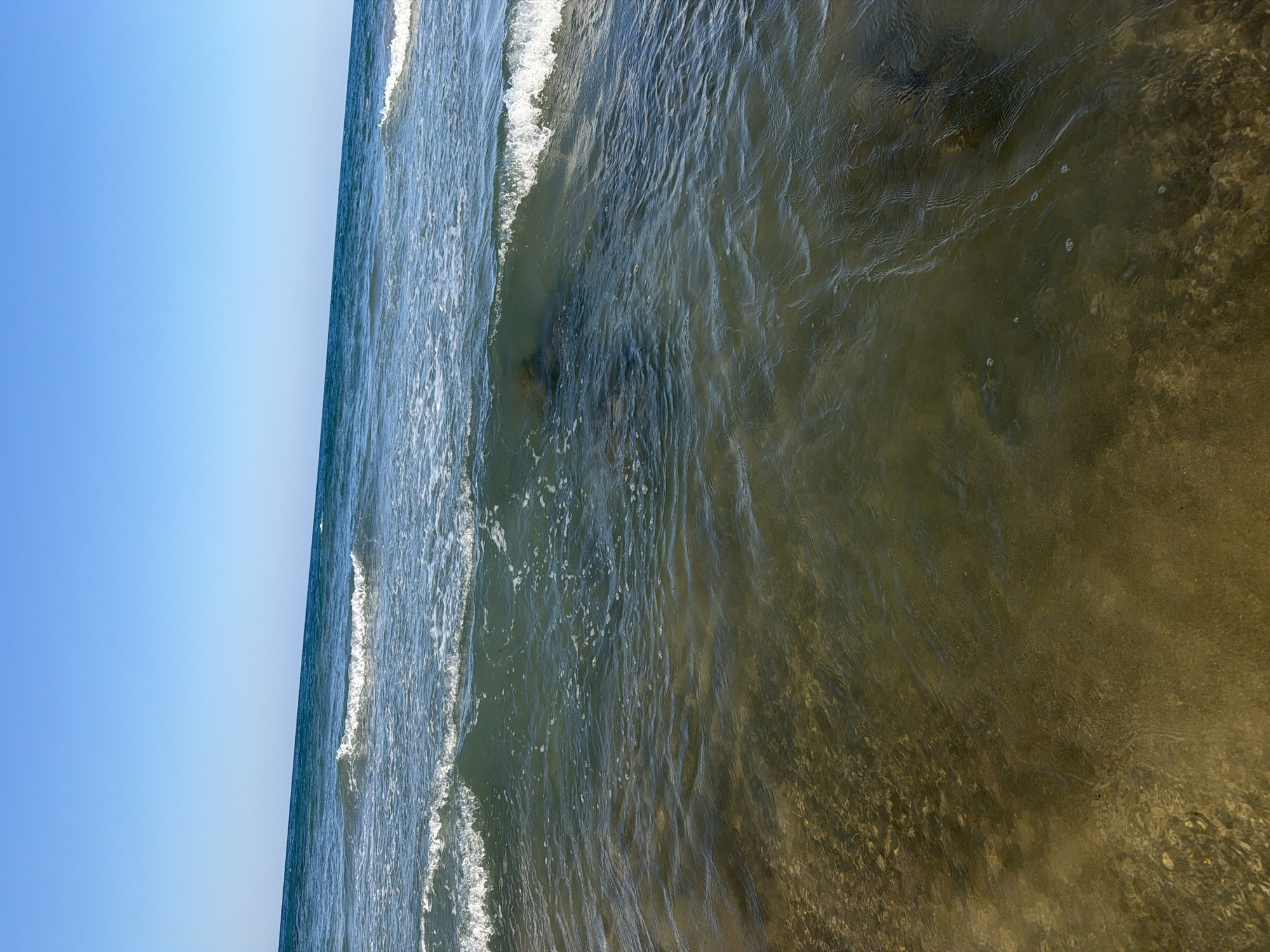 Waves breaking on the Aegean shore at Georgioupoli, Crete