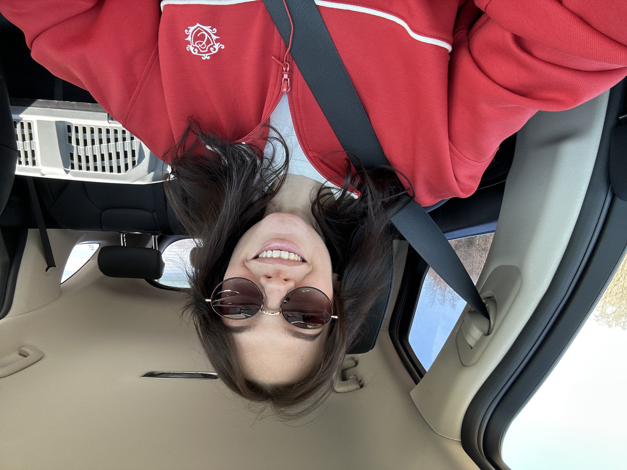 Woman observed upside-down in car in Kabanikha, Russia