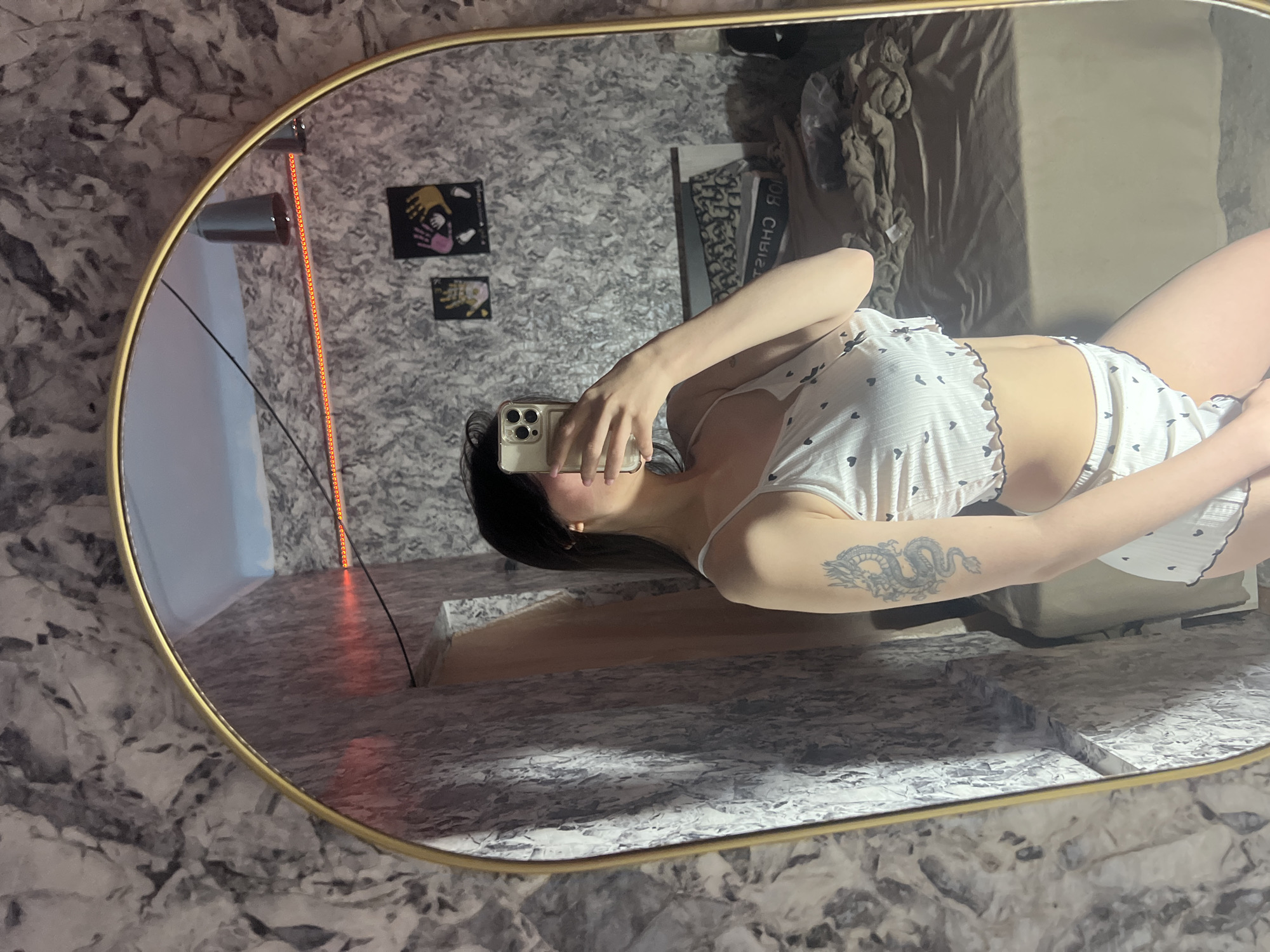 Woman takes mirror selfies in Moldovan village