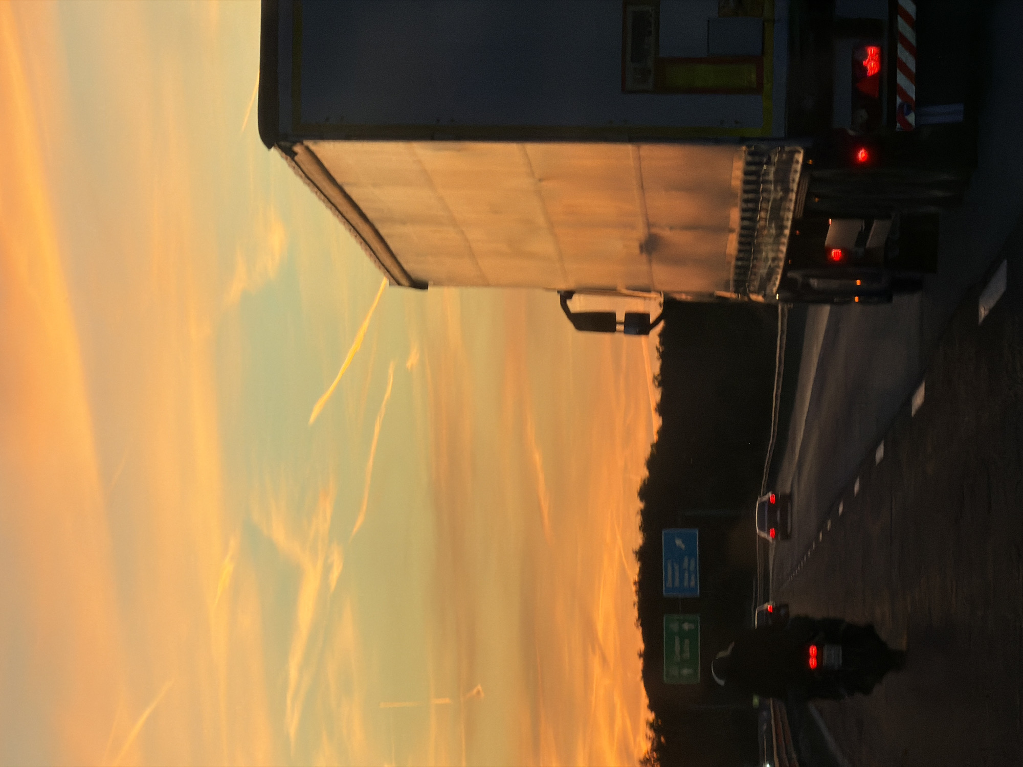 Highway traffic observed during sunset near Baliovtsi, Bulgaria