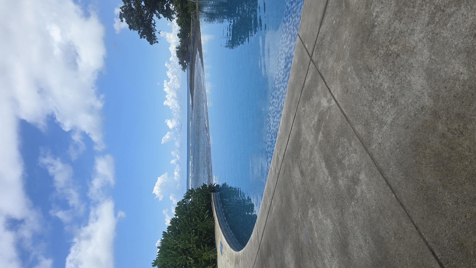 Early morning relaxation at Indonesian beachfront infinity pool resort