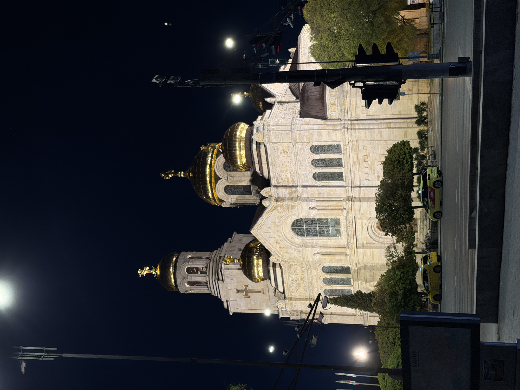 Varna nighttime scenes include illuminated cathedral, police activity