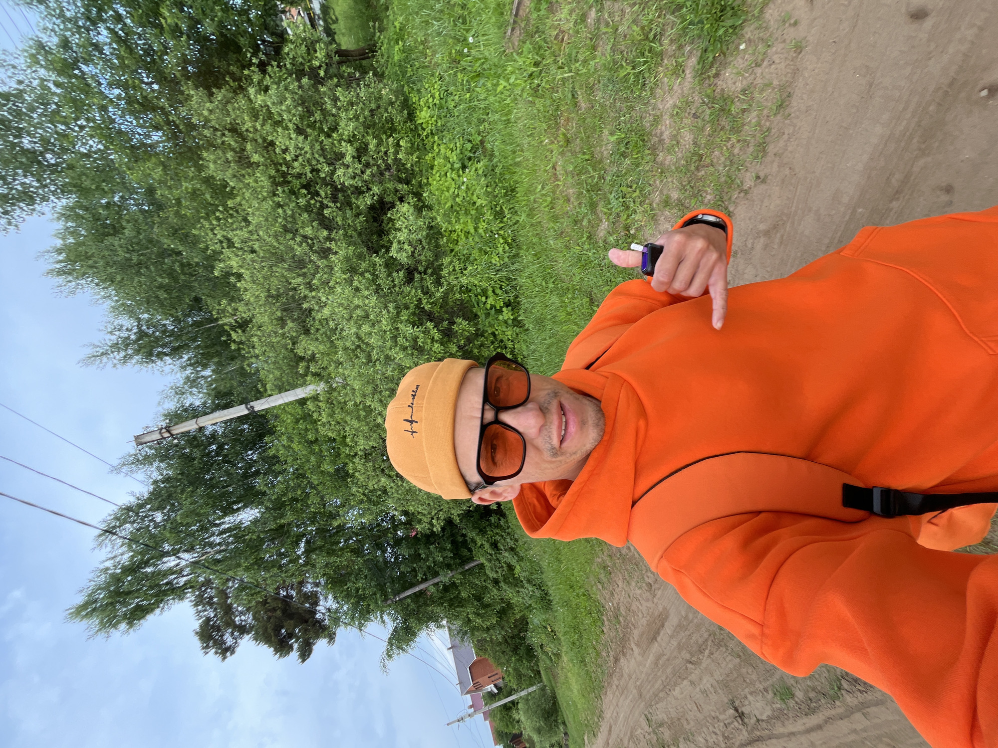 Man in orange photographed multiple times in Chaikovsky, Russia