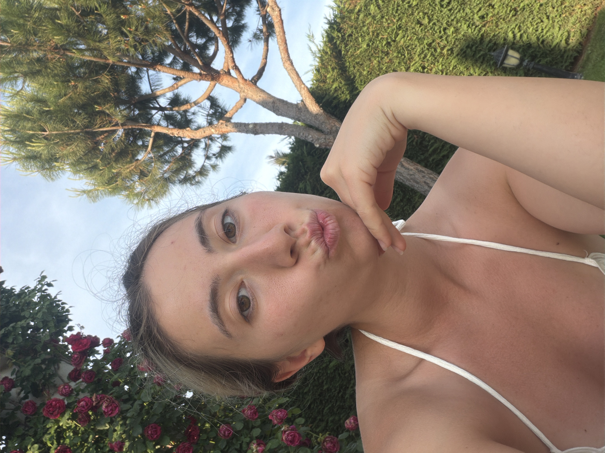 Young woman photographed in outdoor, indoor settings in Tankovo