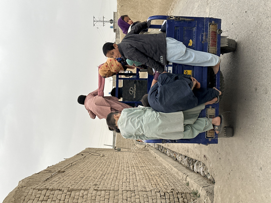 Children gather on Quetta streets under overcast skies