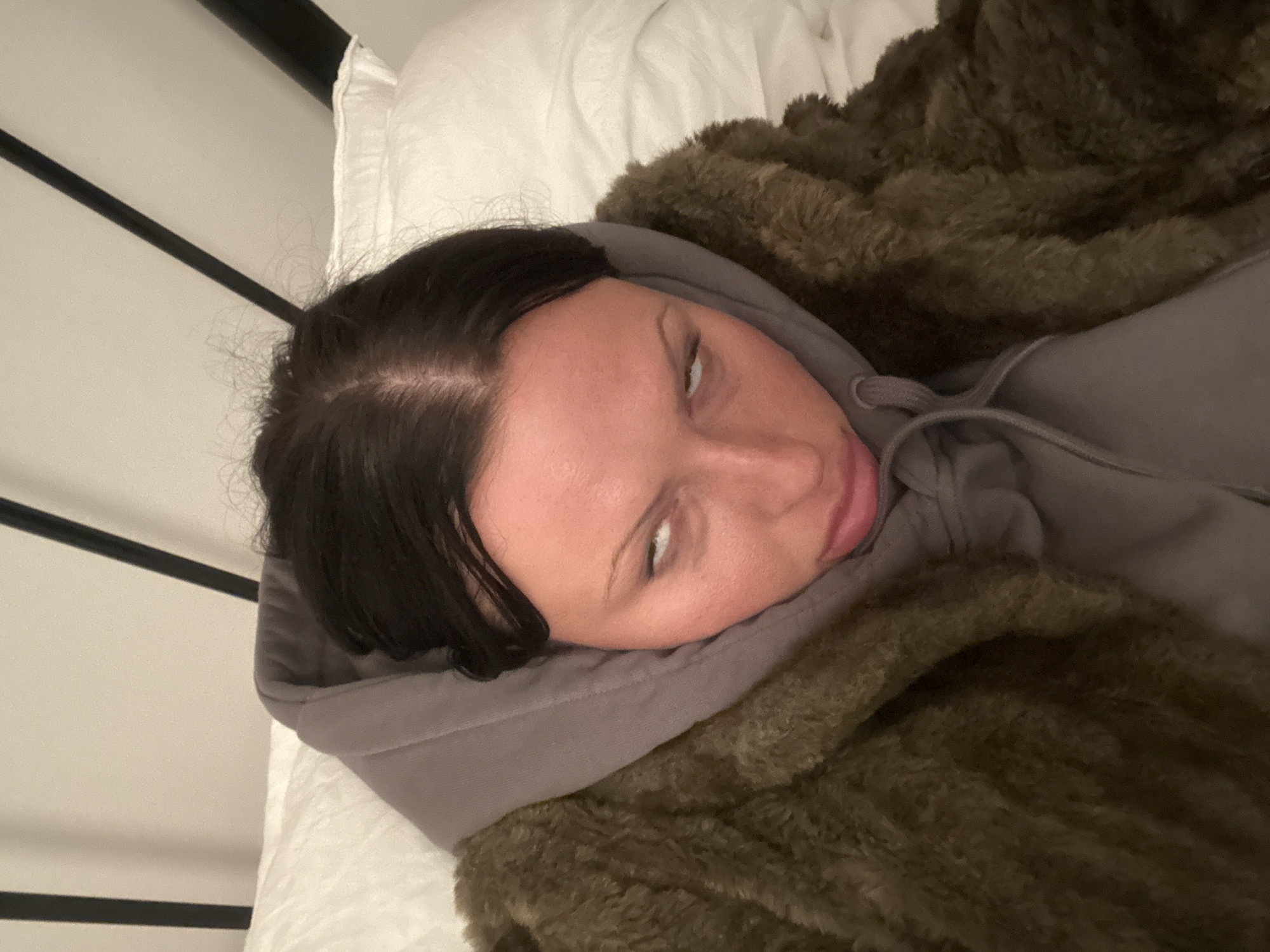 Woman resting in bedroom captured in Tunbridge Wells