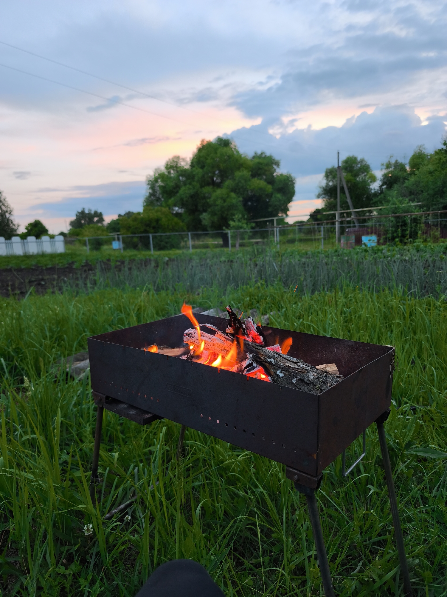 Backyard fire evening at a Russian dacha in Yaganovka