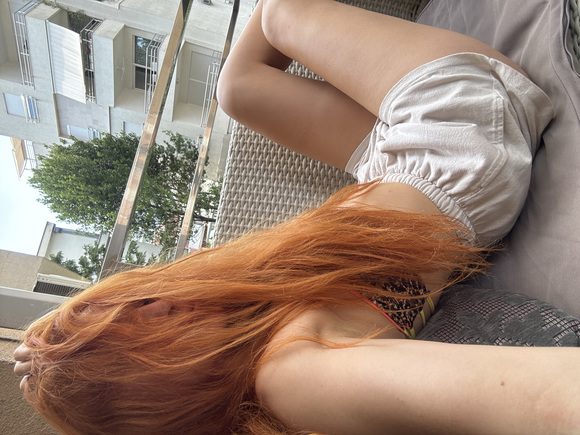 Balcony hangout in Budva with a dog and sunny selfies