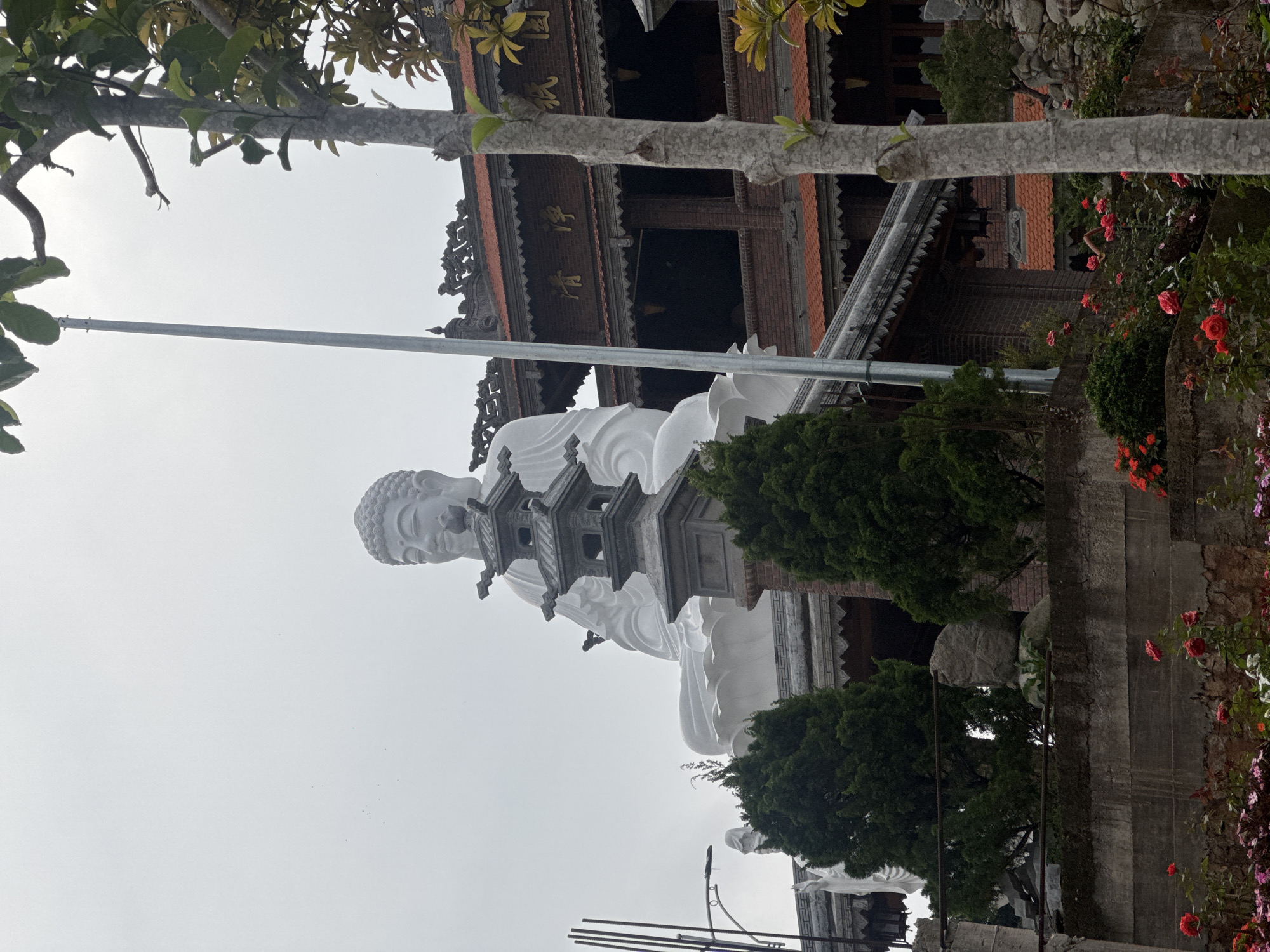 Tourist documents Buddhist temples, gardens in Da Lat Vietnam