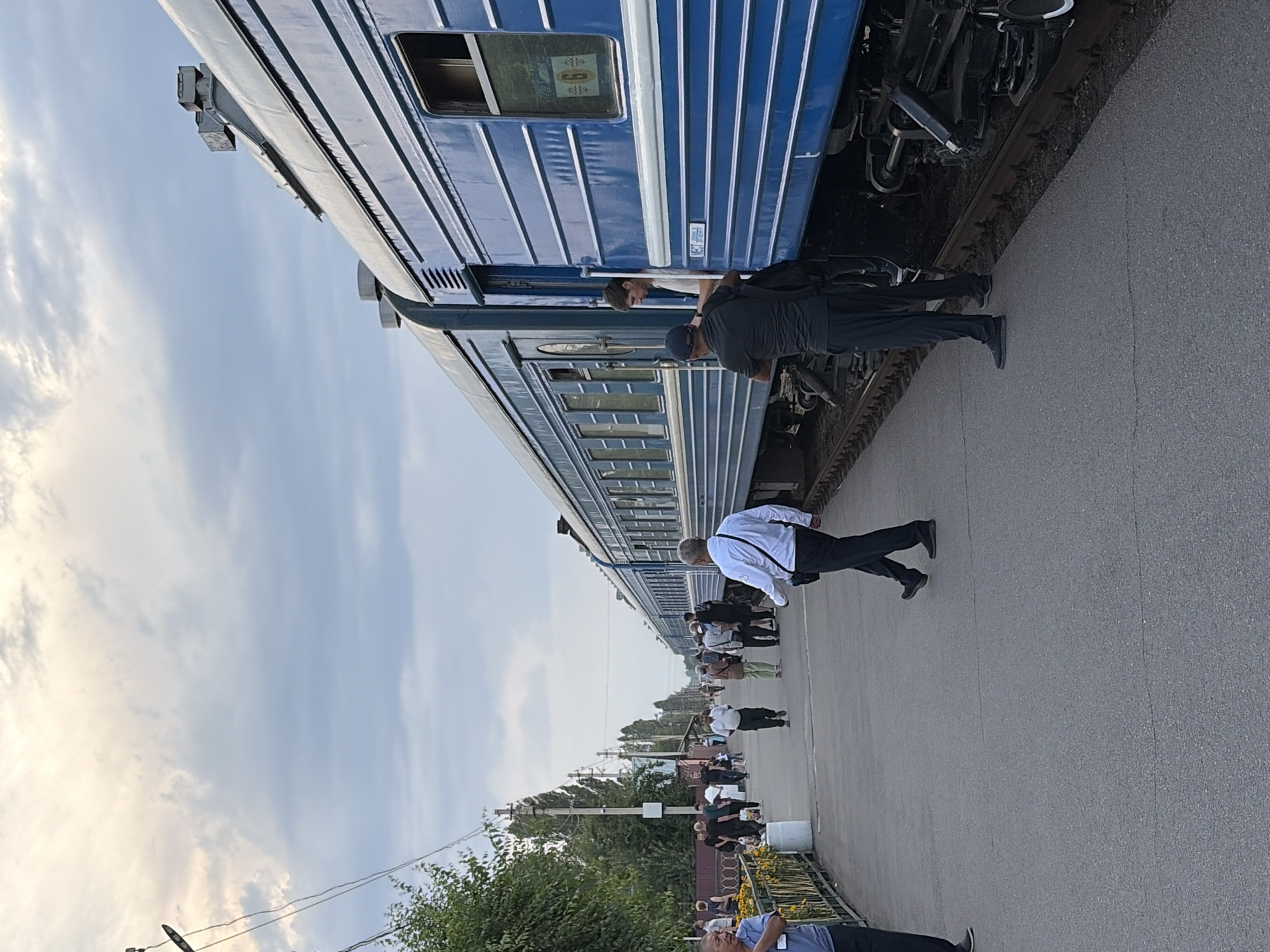 Train activity and crowds at Kant station, Kyrgyzstan