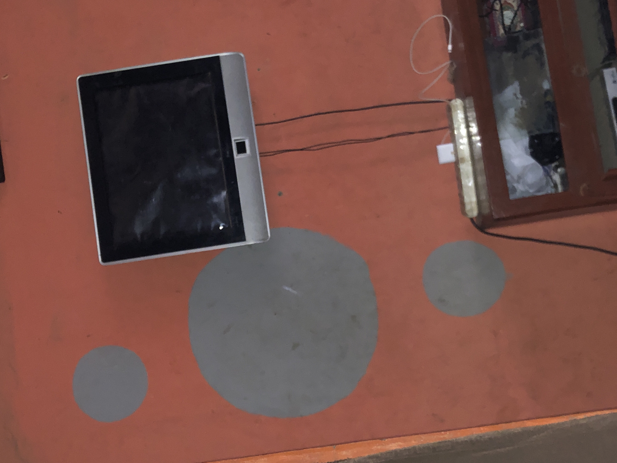 Tablet and wrapped dough material observed at location