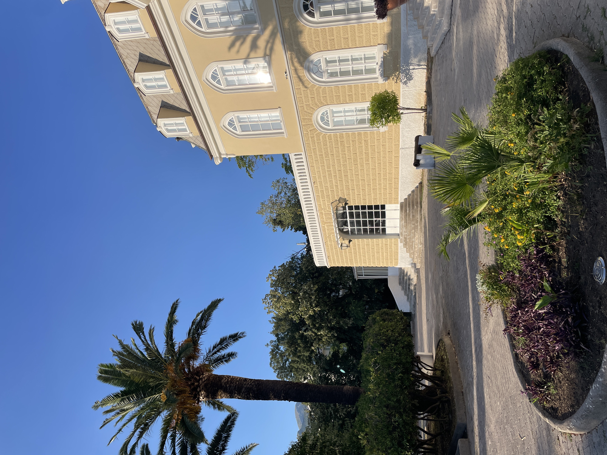Villa Bar's historic yellow facade up close in Montenegro