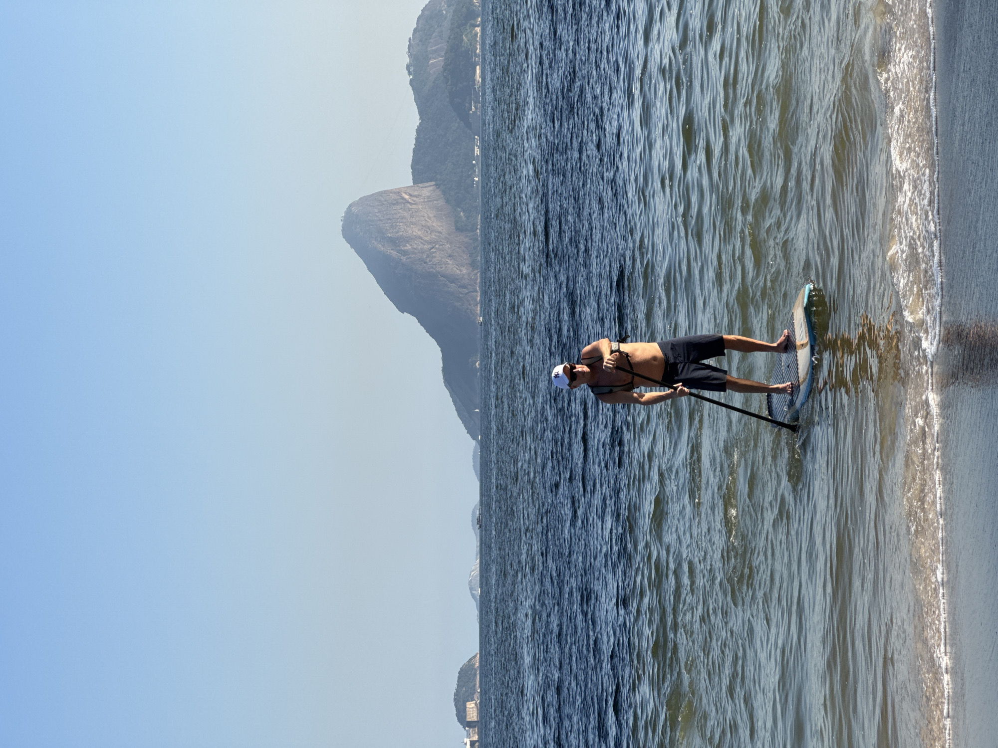 Paddleboarding on choppy waters off Niterói's coast