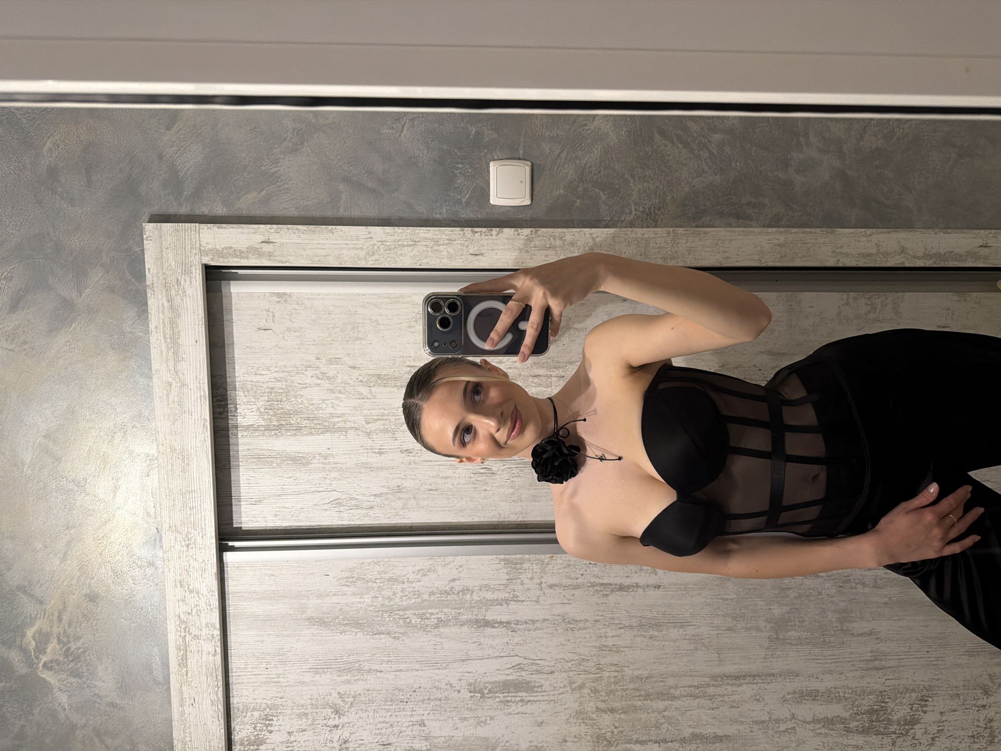 Woman takes selfies indoors in Plovdiv, Bulgaria