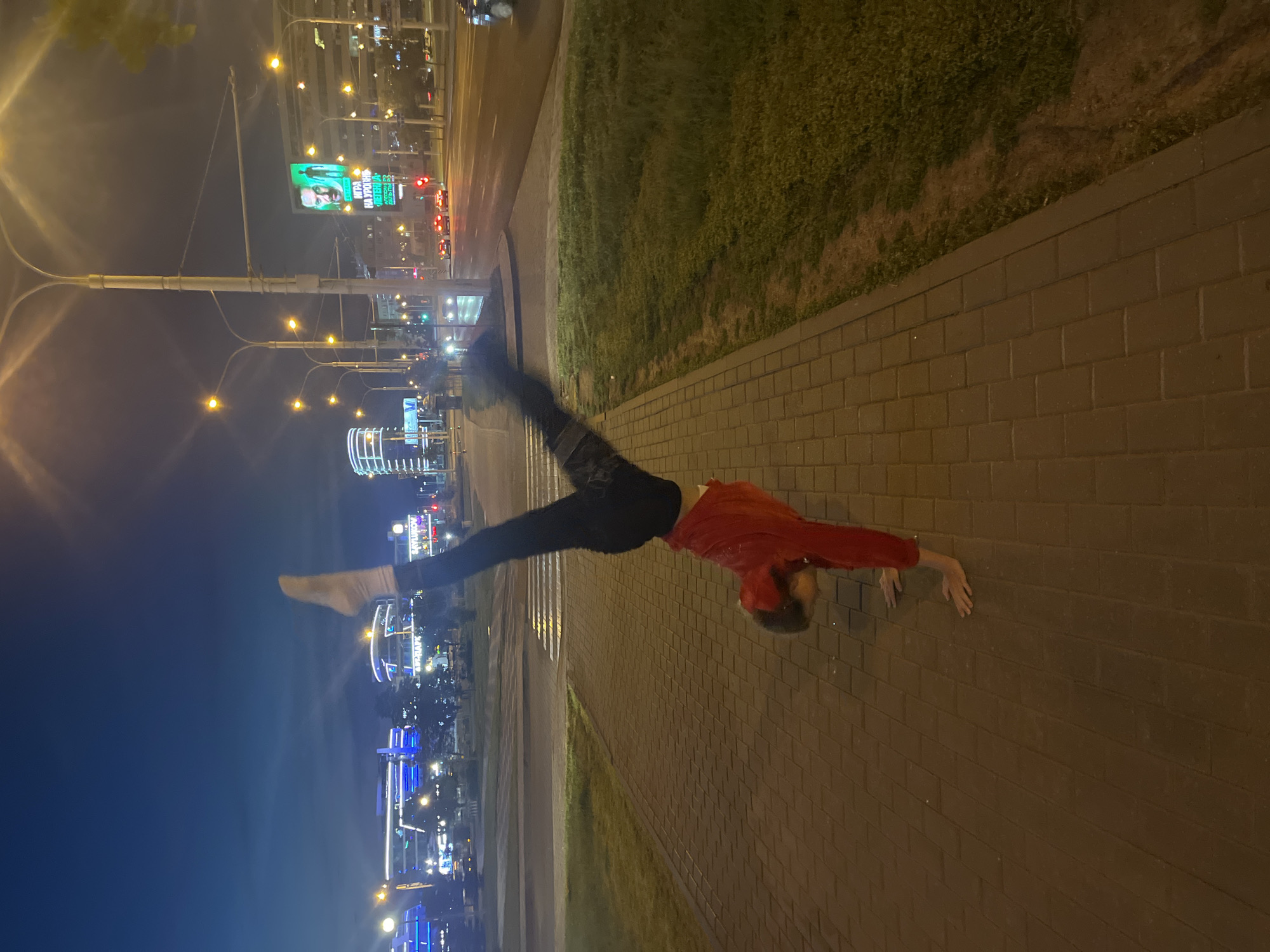 Night out on a Minsk sidewalk, handstands and all
