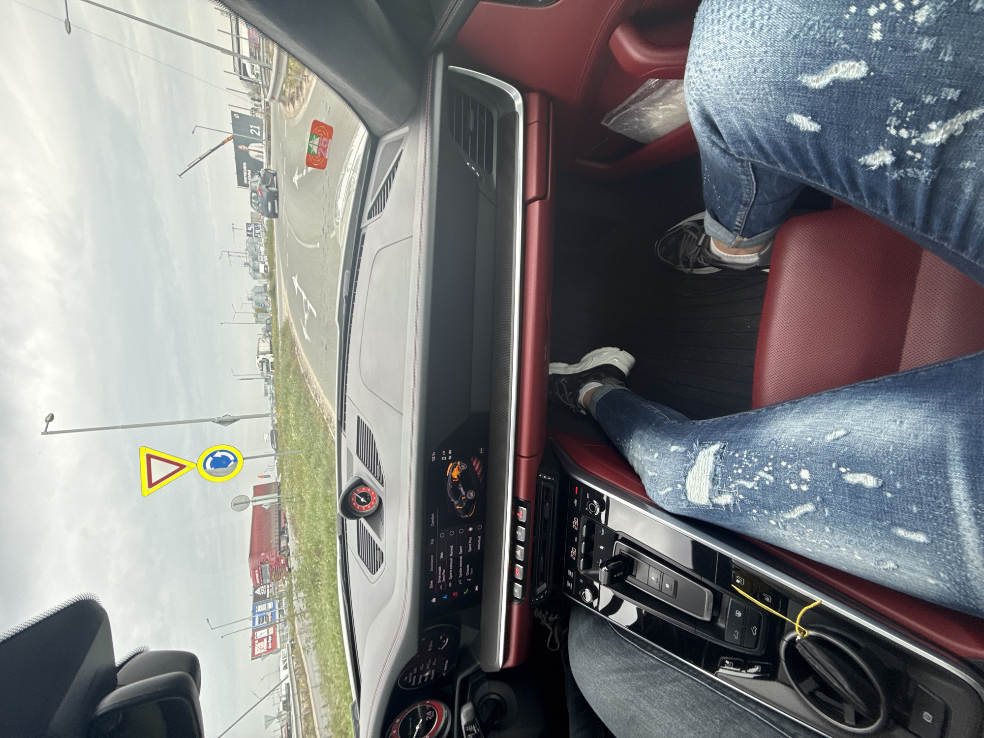 Two people photographed inside Porsche in Trud, Bulgaria