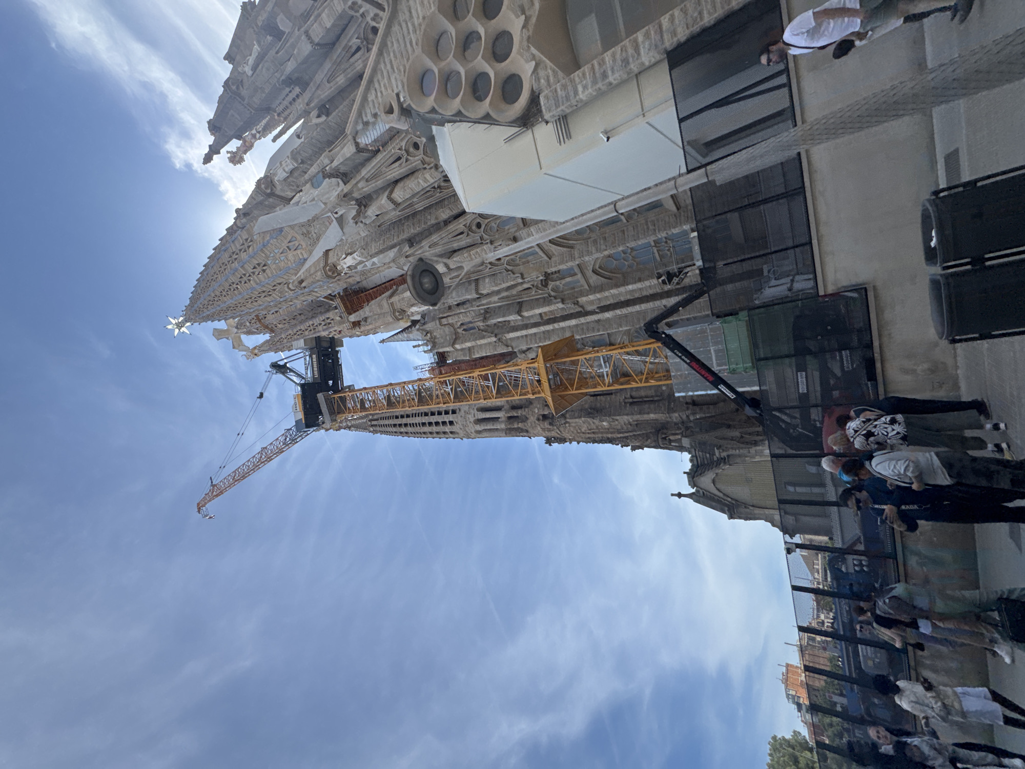 Crowds gather at Barcelona's Sagrada Familia during construction