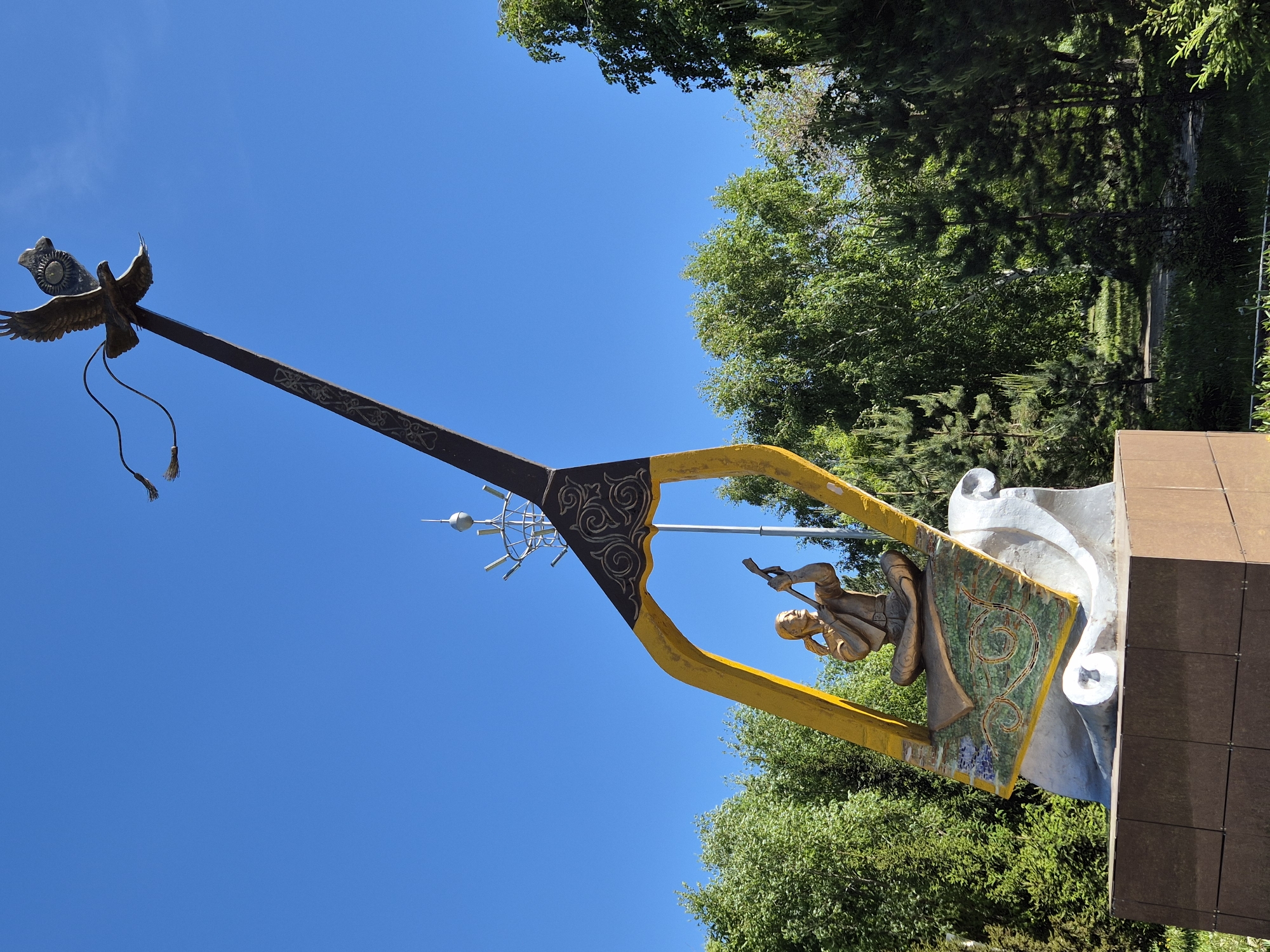 Traditional Kazakh kobyz sculpture with golden eagle spotted in Kokshetau
