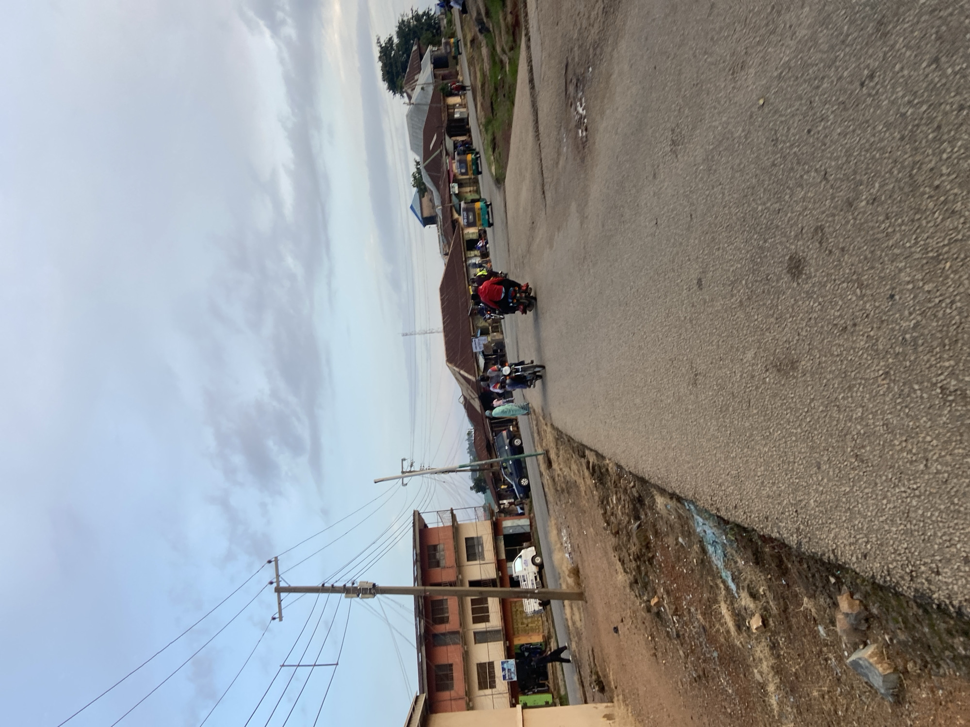 Dusk street life and roadside stalls in Jos, Nigeria
