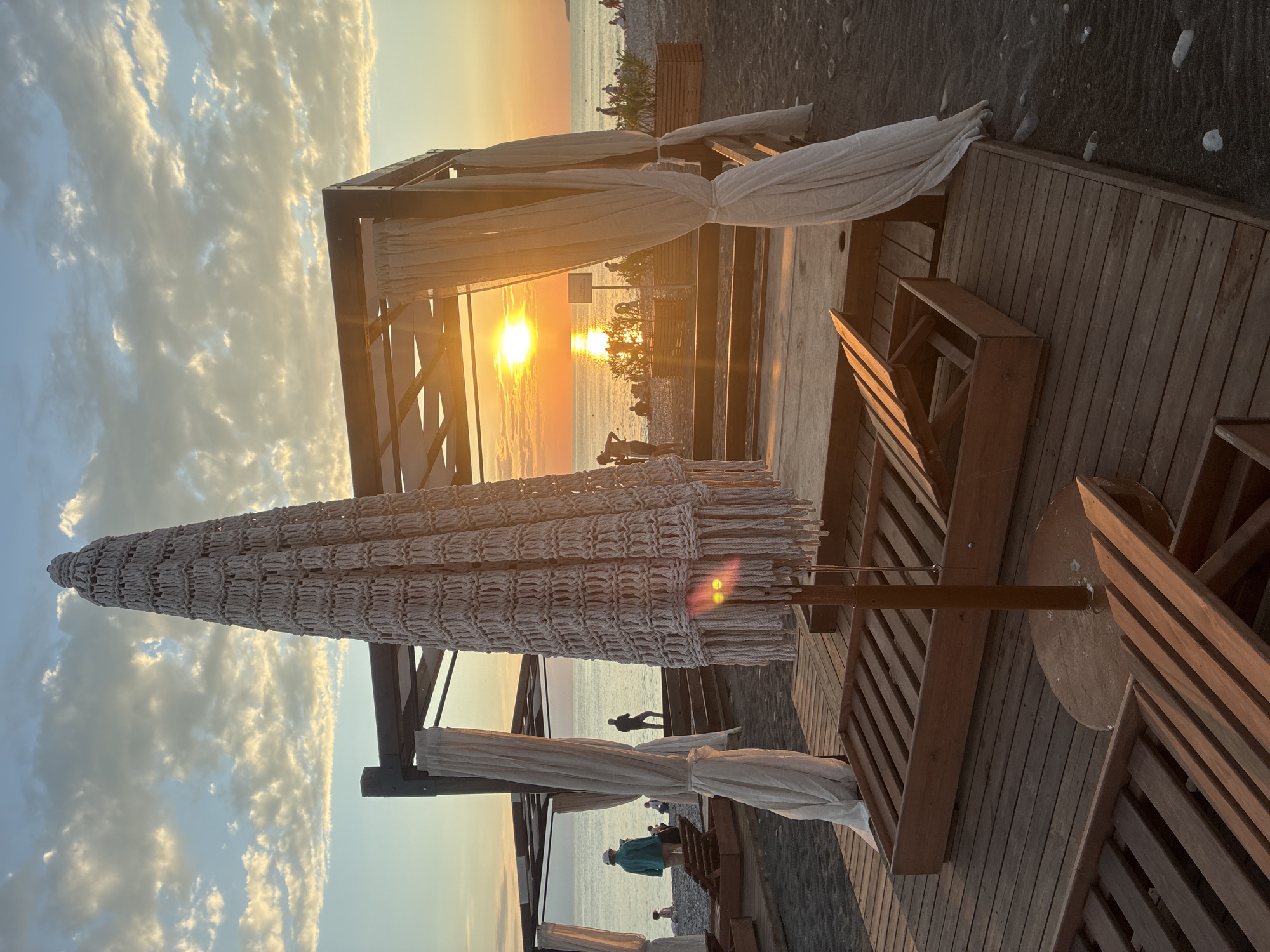 Sochi waterfront at golden hour — beach, marina, and promenade