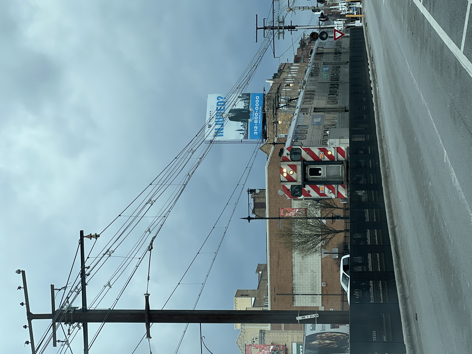 Metra train observed in Chicago street scene evening hours