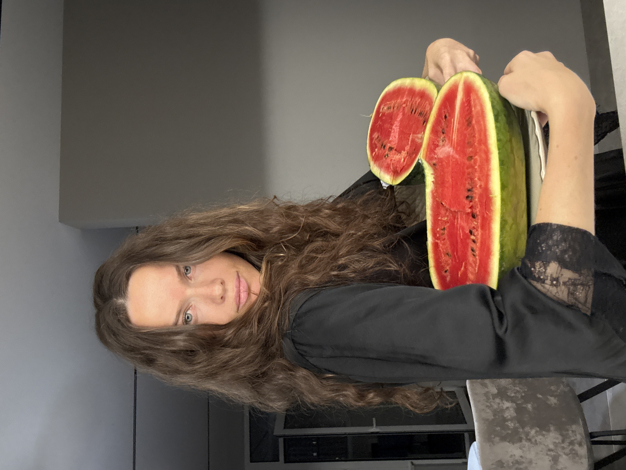 Watermelon moment in a Khimki kitchen, summer evening