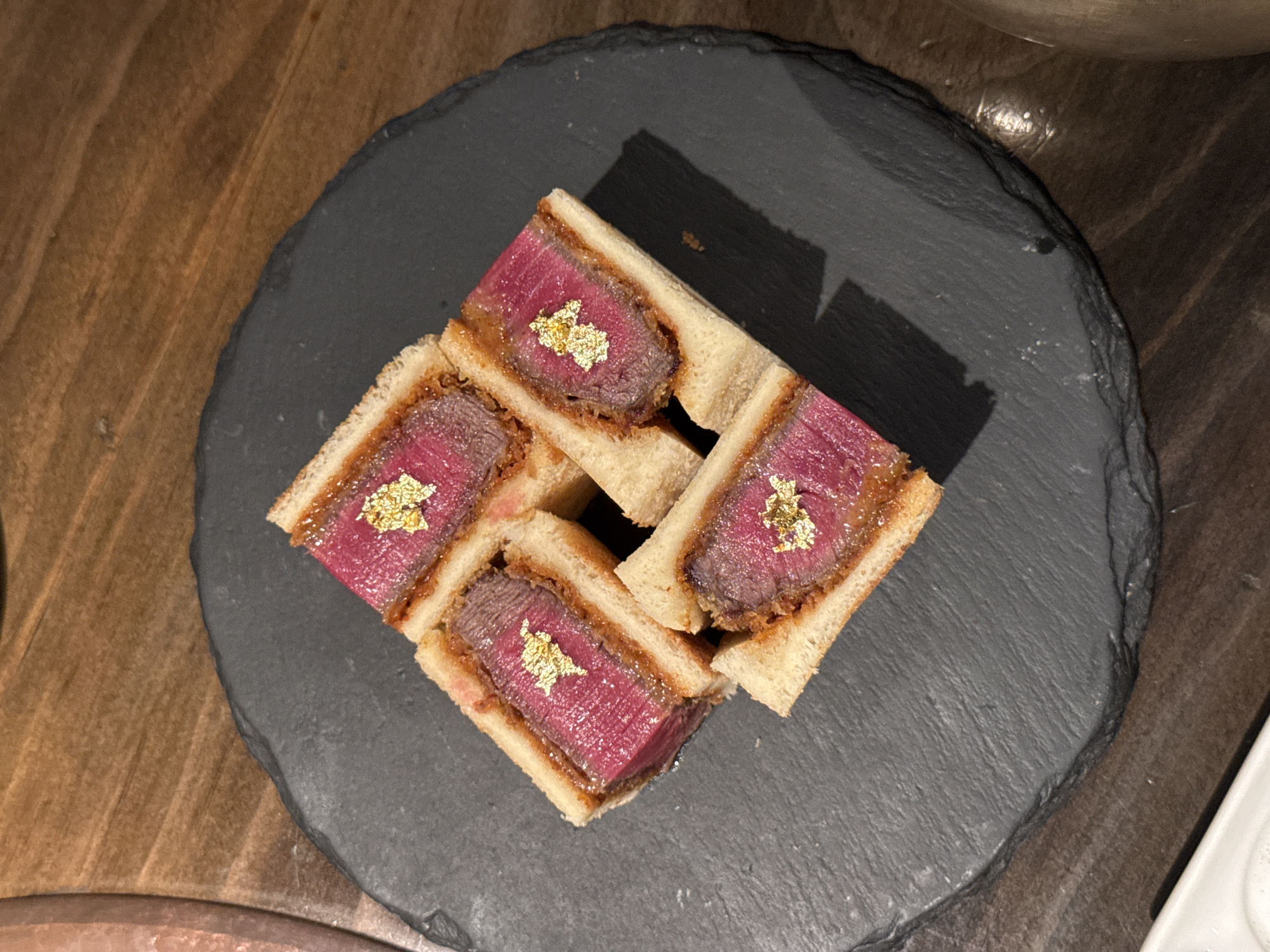 Luxury beef sandwiches with gold leaf photographed in Seoul