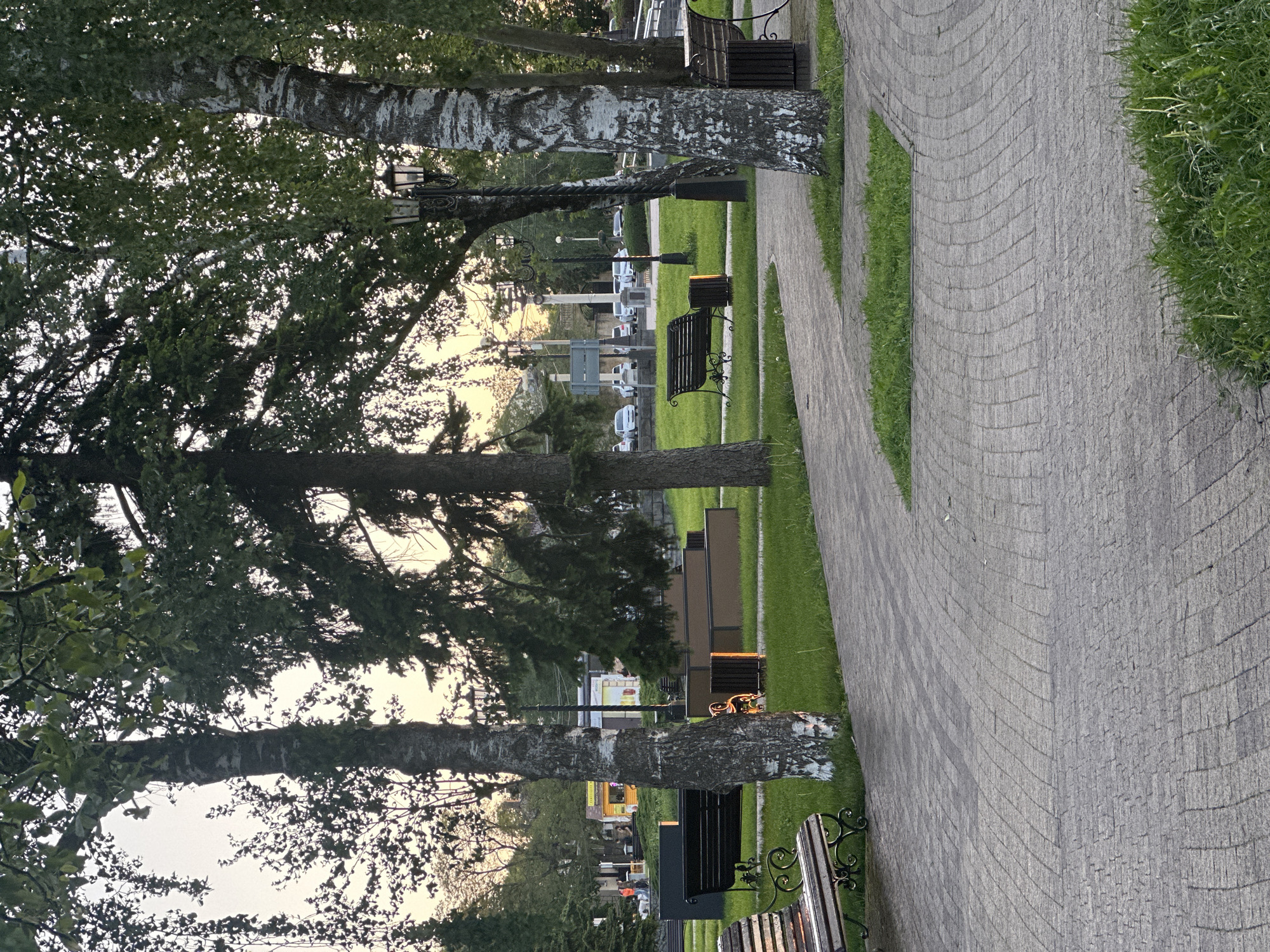 Park walkway with benches observed in Stavropol, Russia