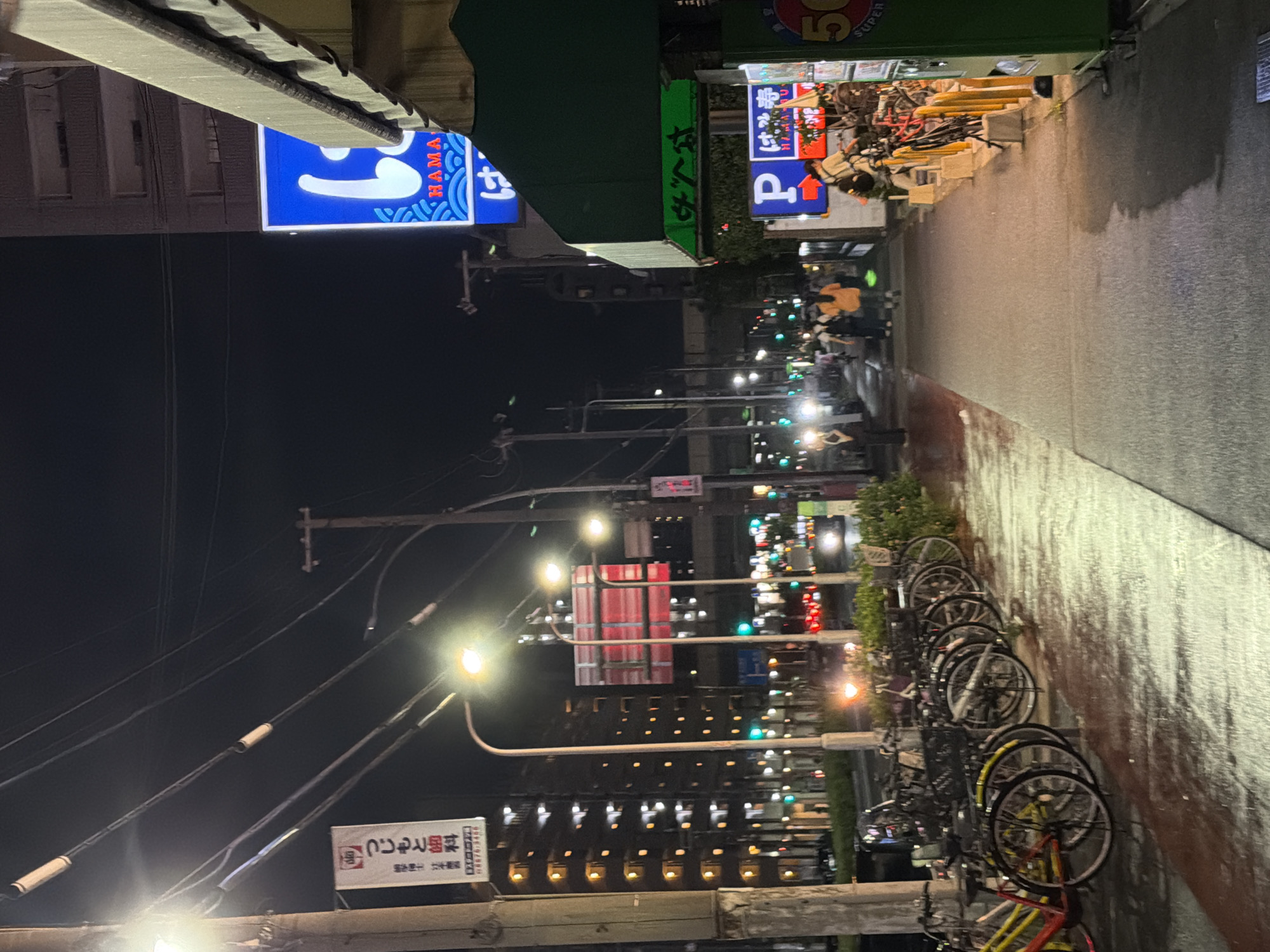 Diner uses self-service kiosks at Osaka sushi restaurant