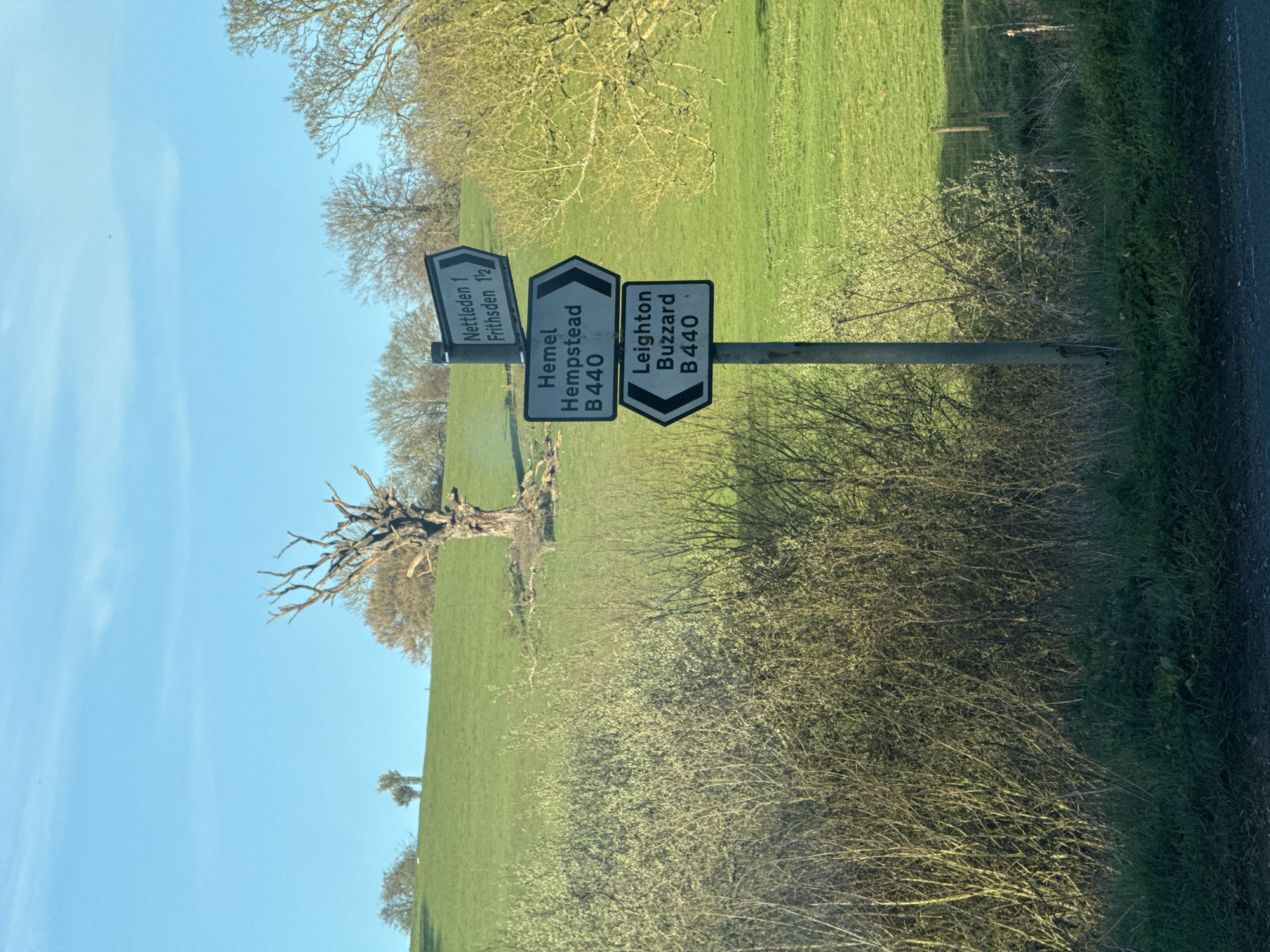 Rural signpost observed in Dacorum showing local directions
