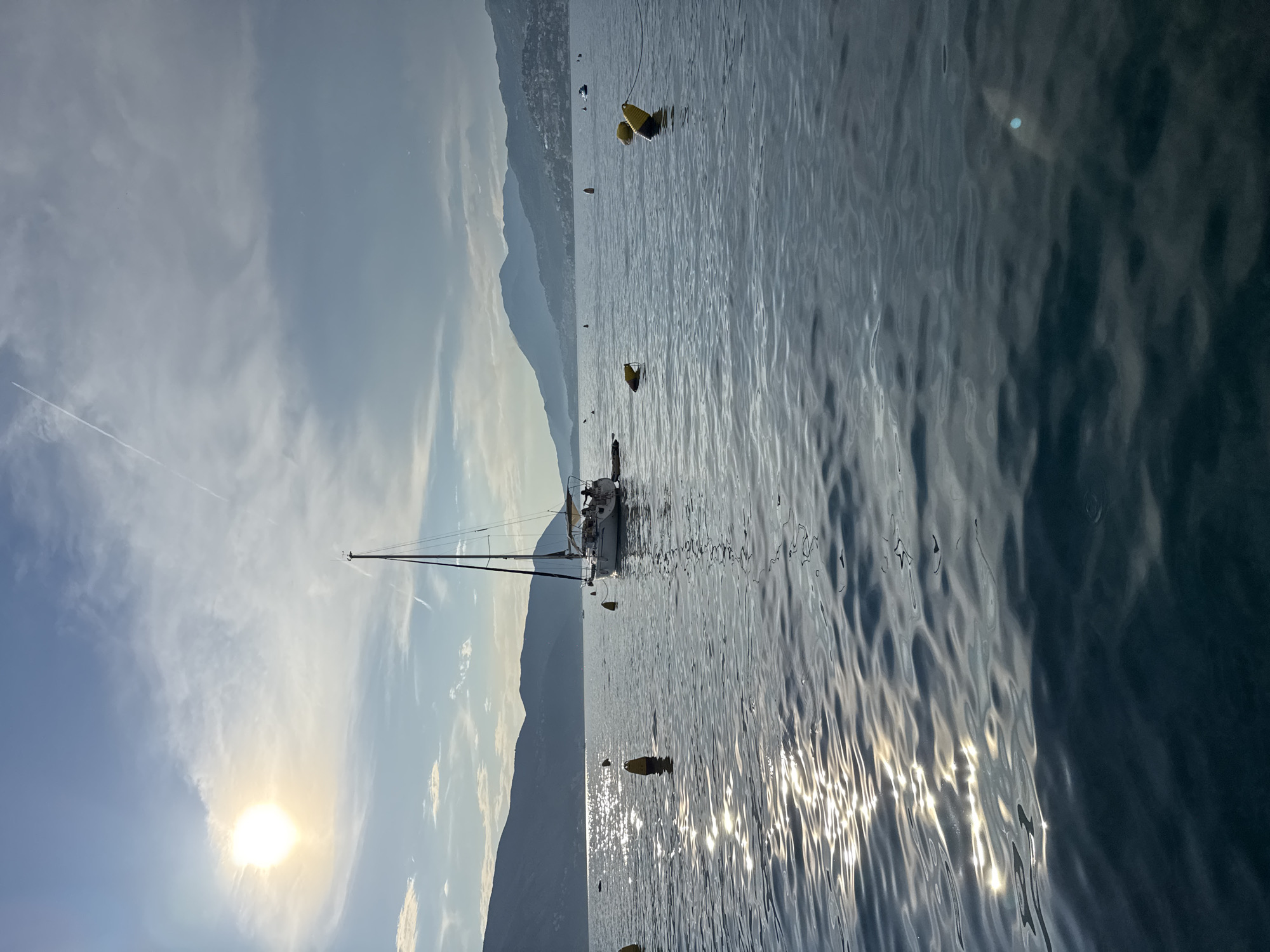 Sunny afternoon sailing and beers at a Mediterranean coastal town