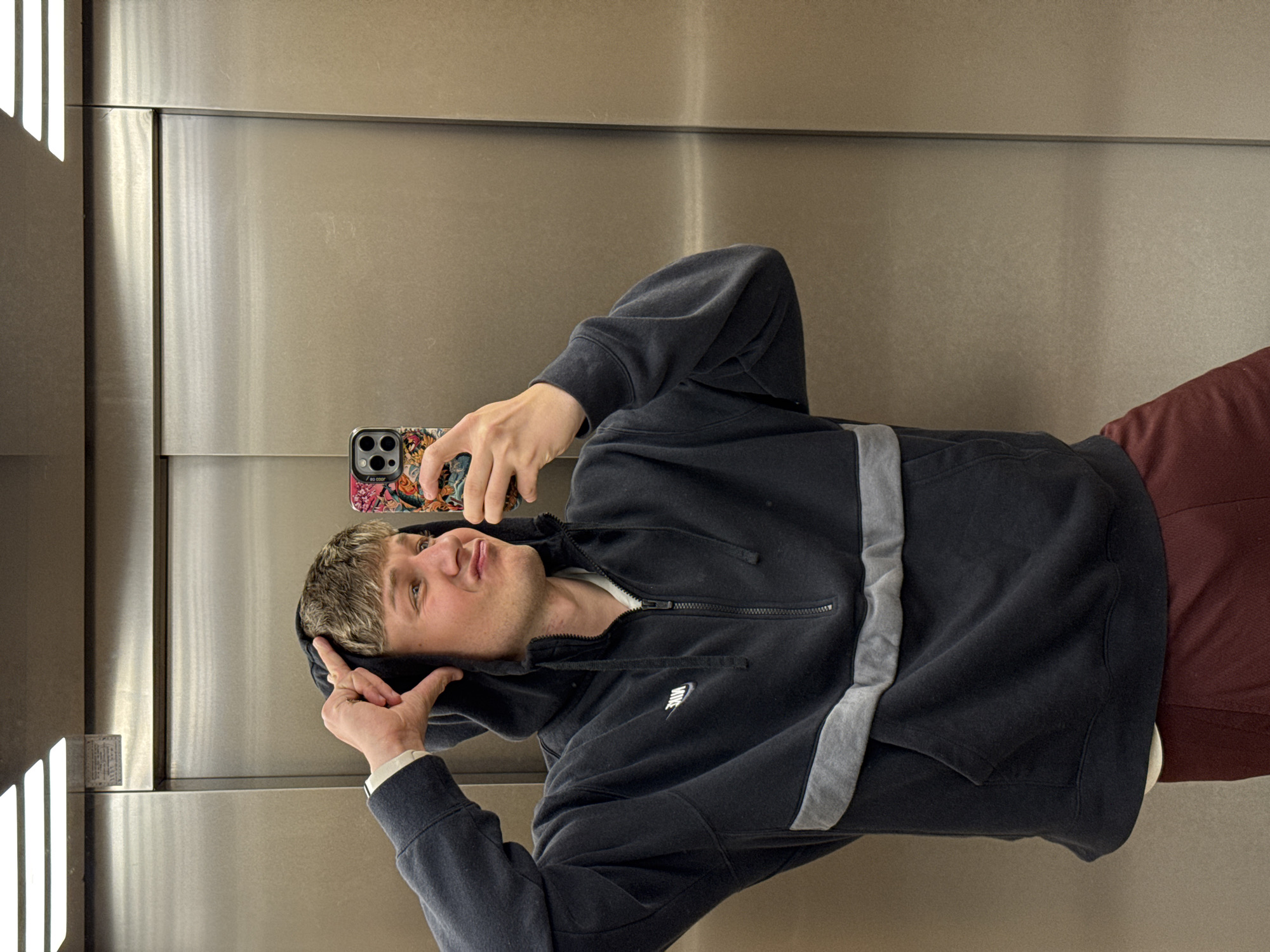 Young man takes elevator selfies in Plovdiv