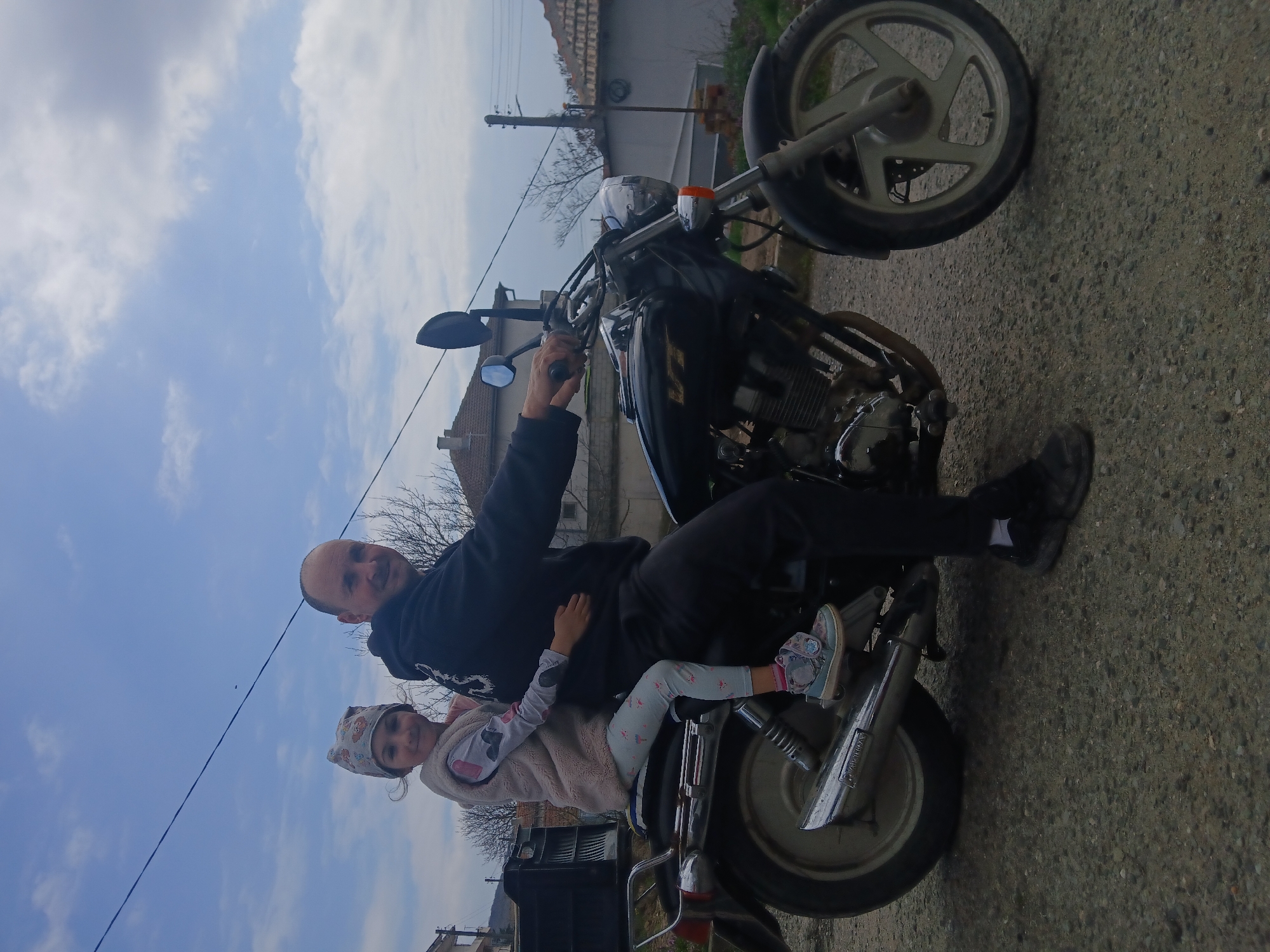 Family motorcycle outing with children documented in Bulgarian towns