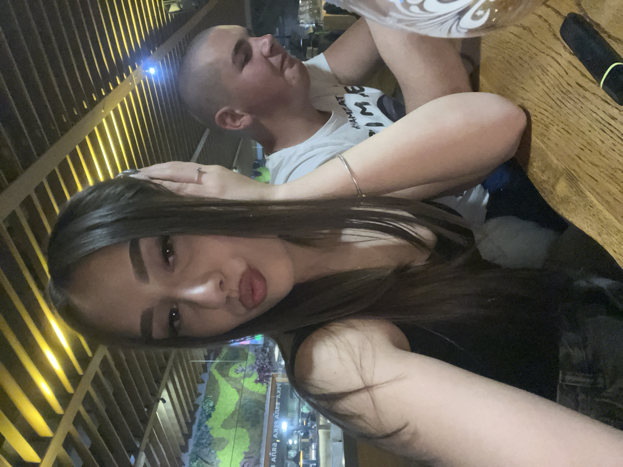 Couple takes selfie at restaurant in Kalofer, Bulgaria