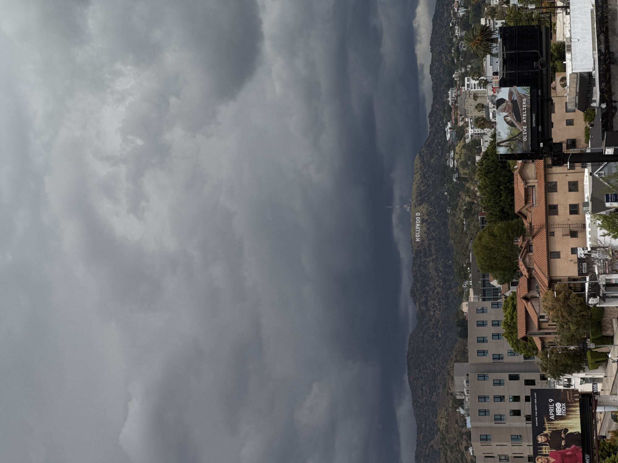 Hollywood Sign viewed under cloudy skies Monday evening