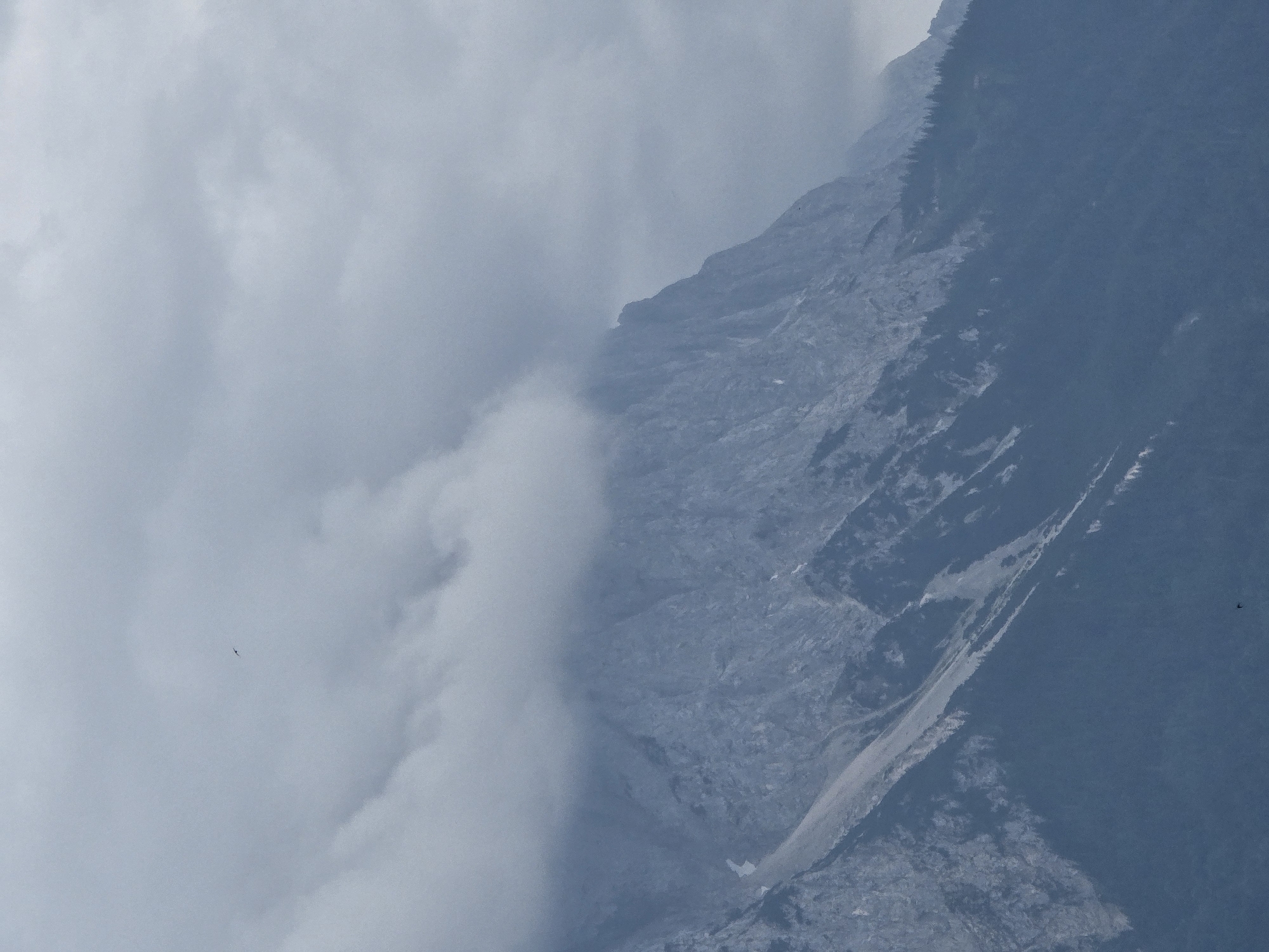 Alpine peaks and town edges, Garmisch-Partenkirchen under overcast skies