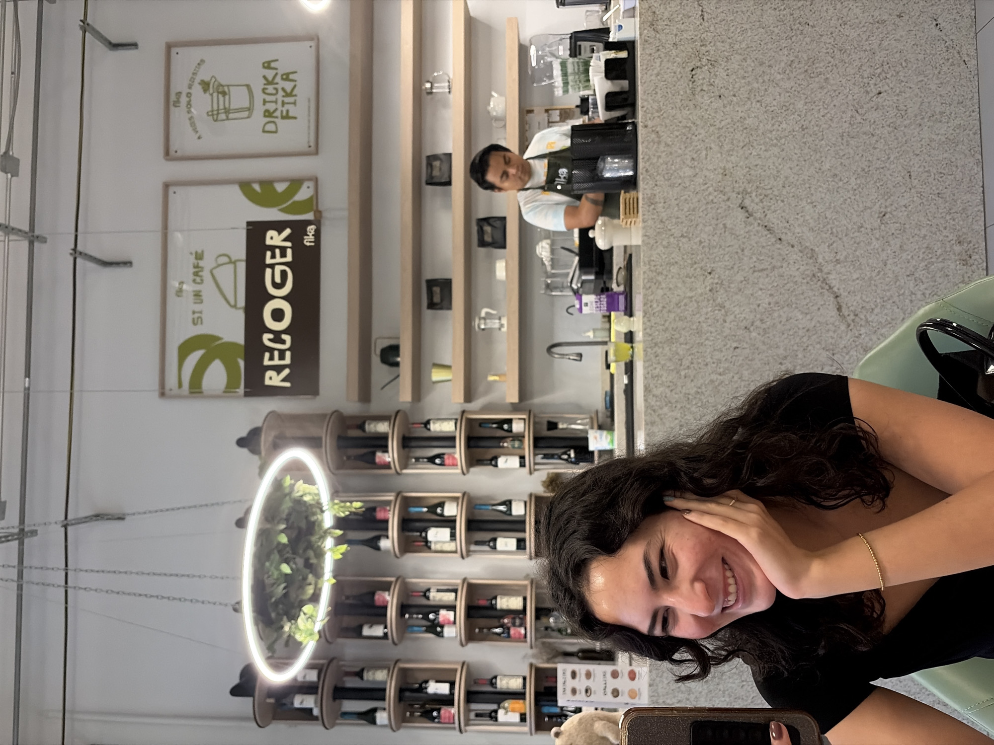 Woman takes selfies at Puebla cafe late Tuesday night