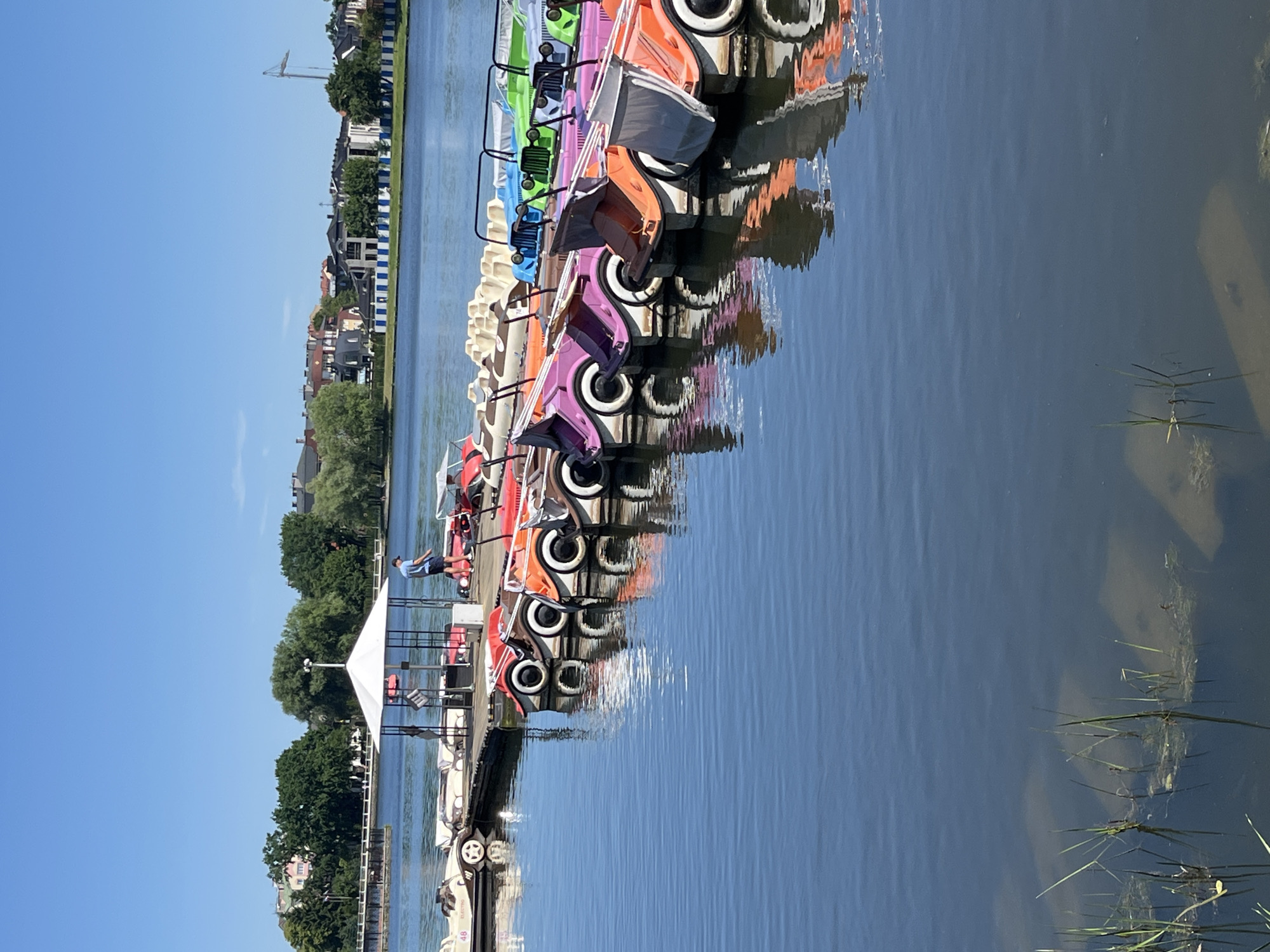 Kaliningrad waterfront: canals, parks, and pedal boats on a sunny morning