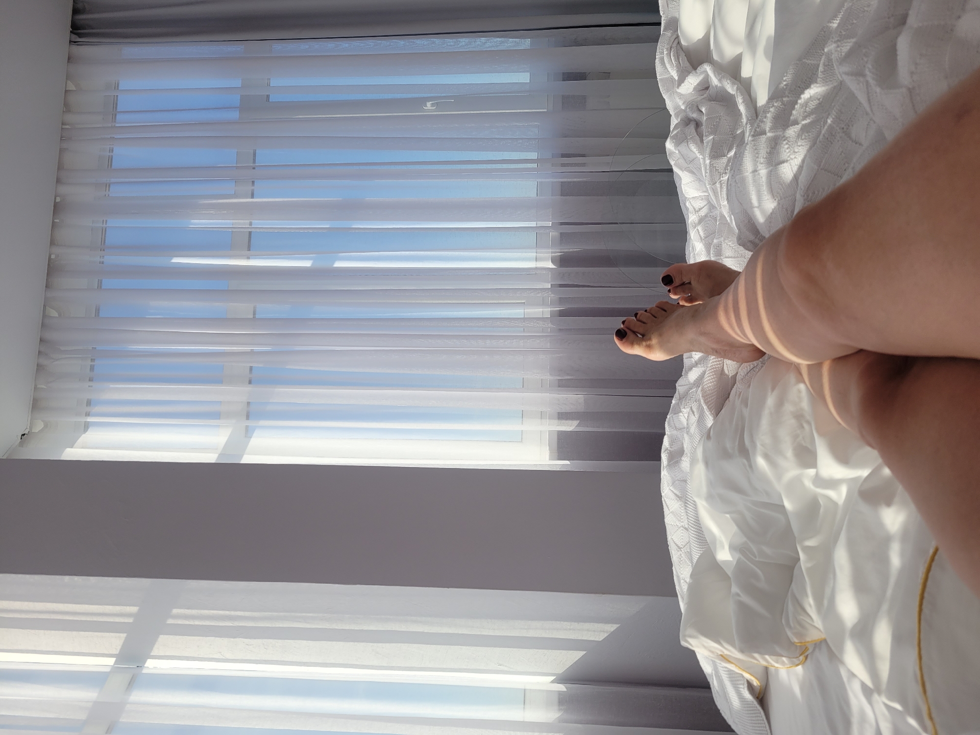 Person rests in bedroom during early morning hours