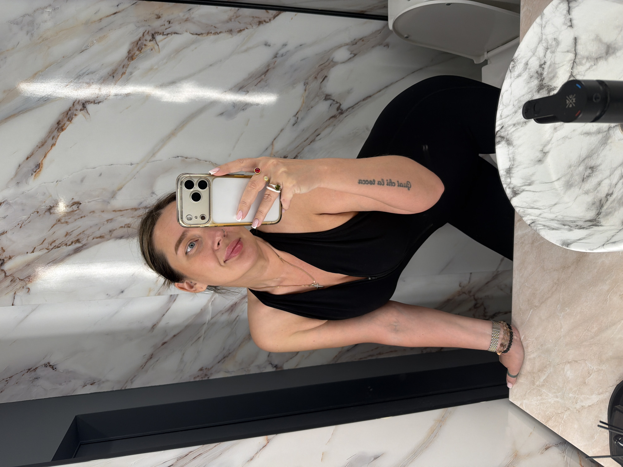Woman takes bathroom selfie in Moscow